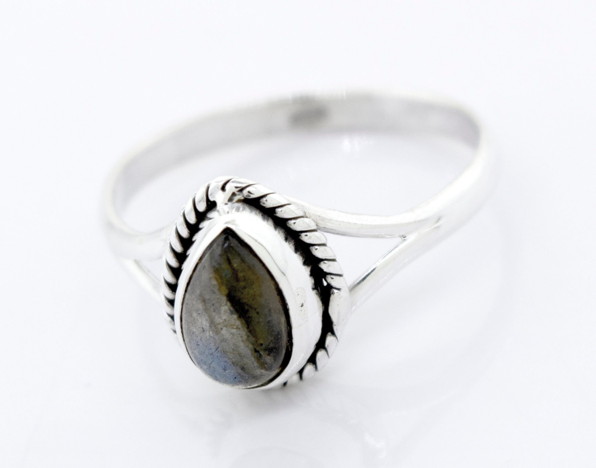 Vibrant Teardrop Shape Stone Ring with a pear-shaped, bezel-set gray stone on a white background.