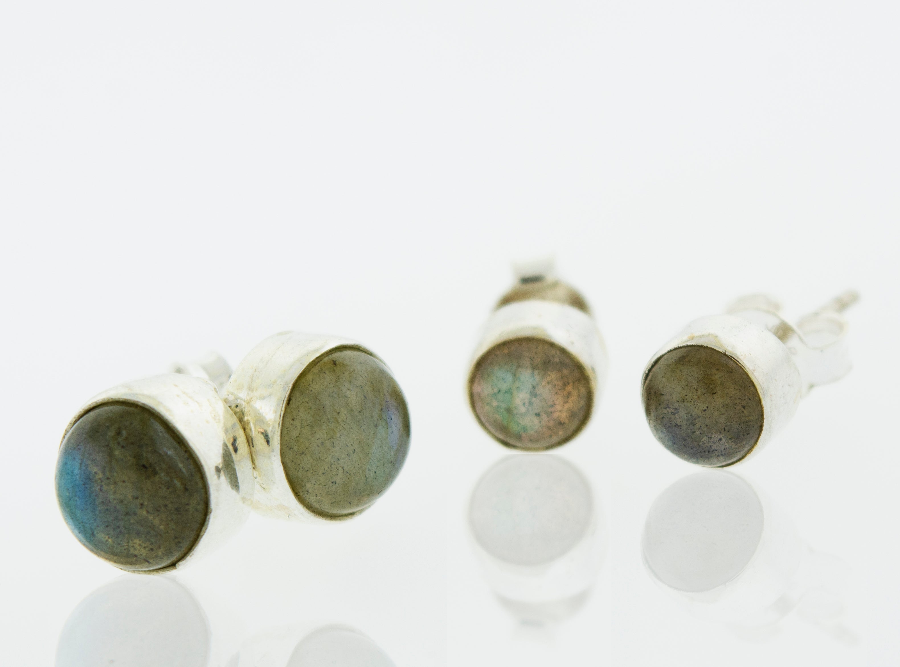 A pair of Simple Circle Labradorite Studs by Super Silver, perfect for every day wear, displayed on a white surface.