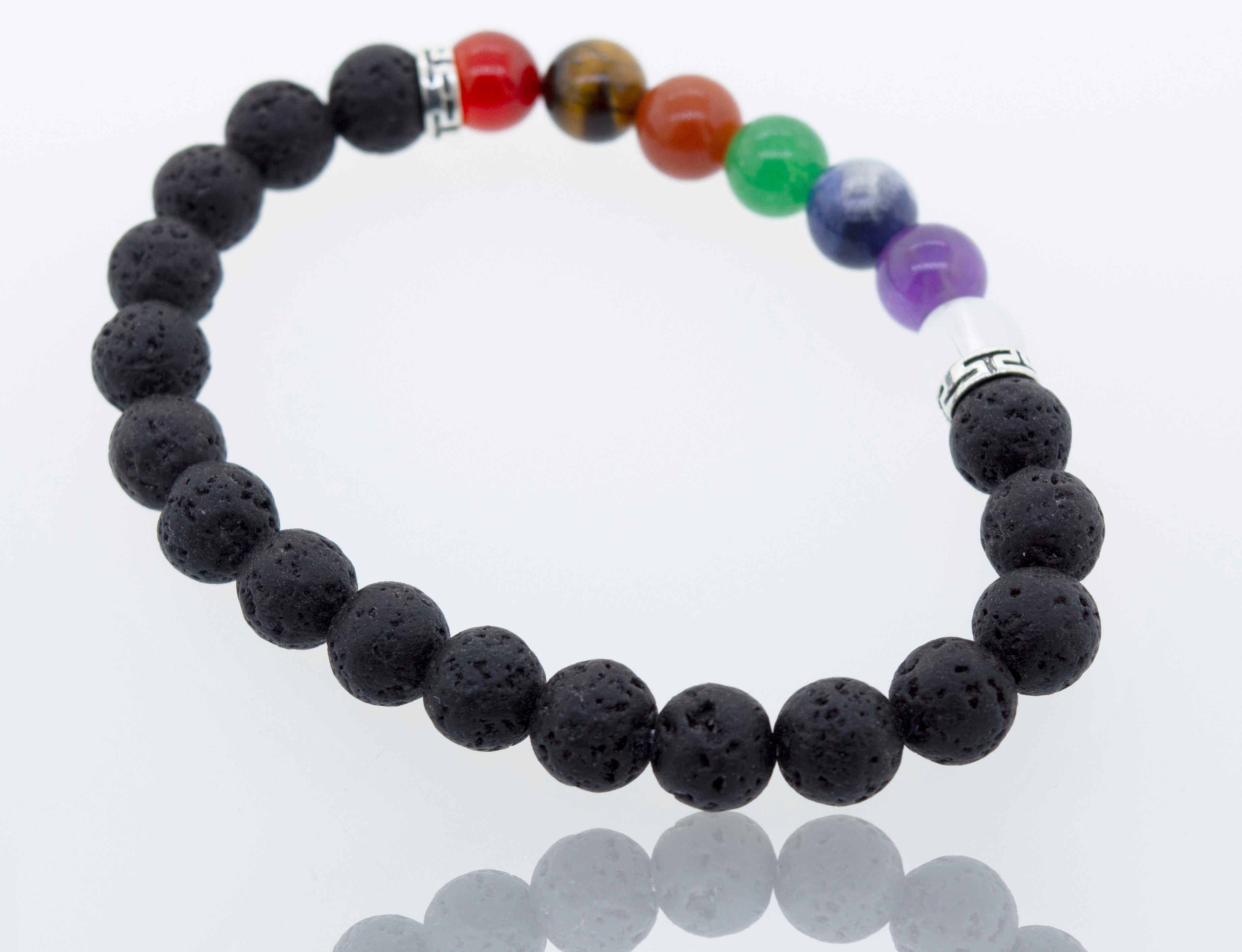 This Essential Oil Bracelet with Lava and Chakra Stones from Super Silver features colorful stones, providing balance and chakra energy.