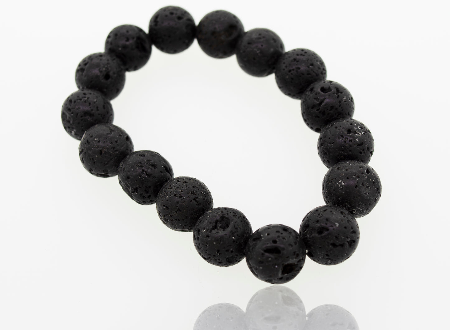 
                  
                    A Super Silver Essential Oil Bracelet with Lava Rock Beads, a grounding stone, on a white surface.
                  
                