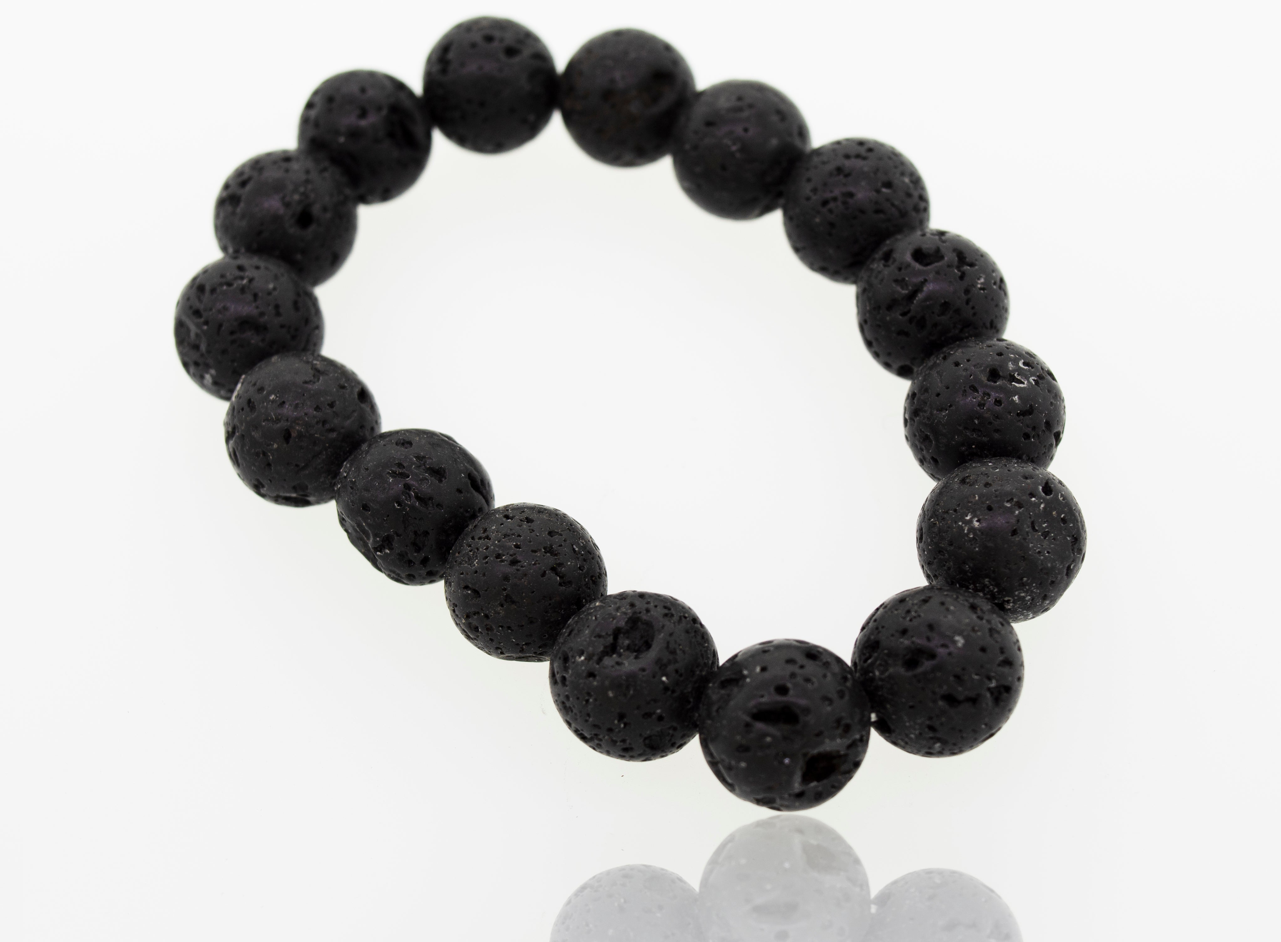 A Super Silver Essential Oil Bracelet with Lava Rock Beads, a grounding stone, on a white surface.