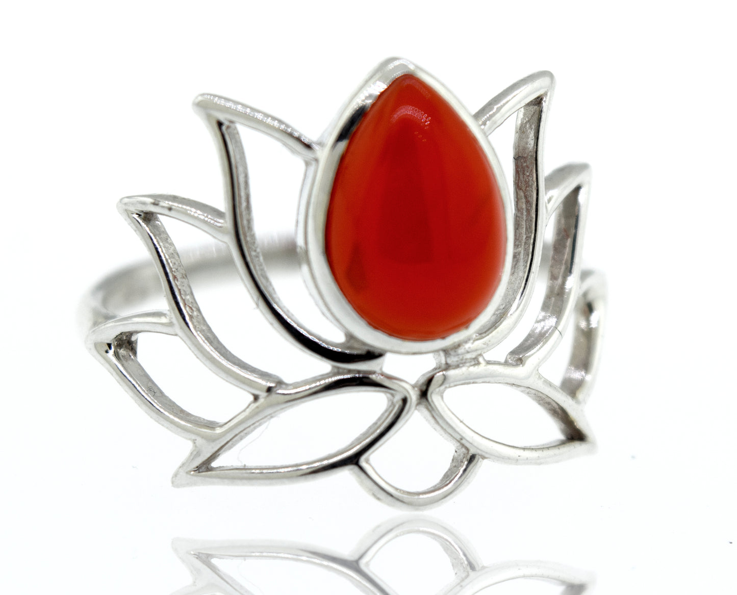 
                  
                    Online Exclusive Teardrop Stone Lotus Ring with a central red teardrop gemstone on a reflective surface.
                  
                