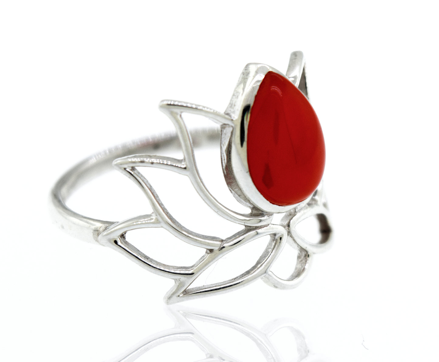 
                  
                    Online Exclusive Teardrop Stone Lotus Ring with an intricate leaf design and a large, teardrop-shaped red gemstone set in the center, displayed on a reflective surface.
                  
                