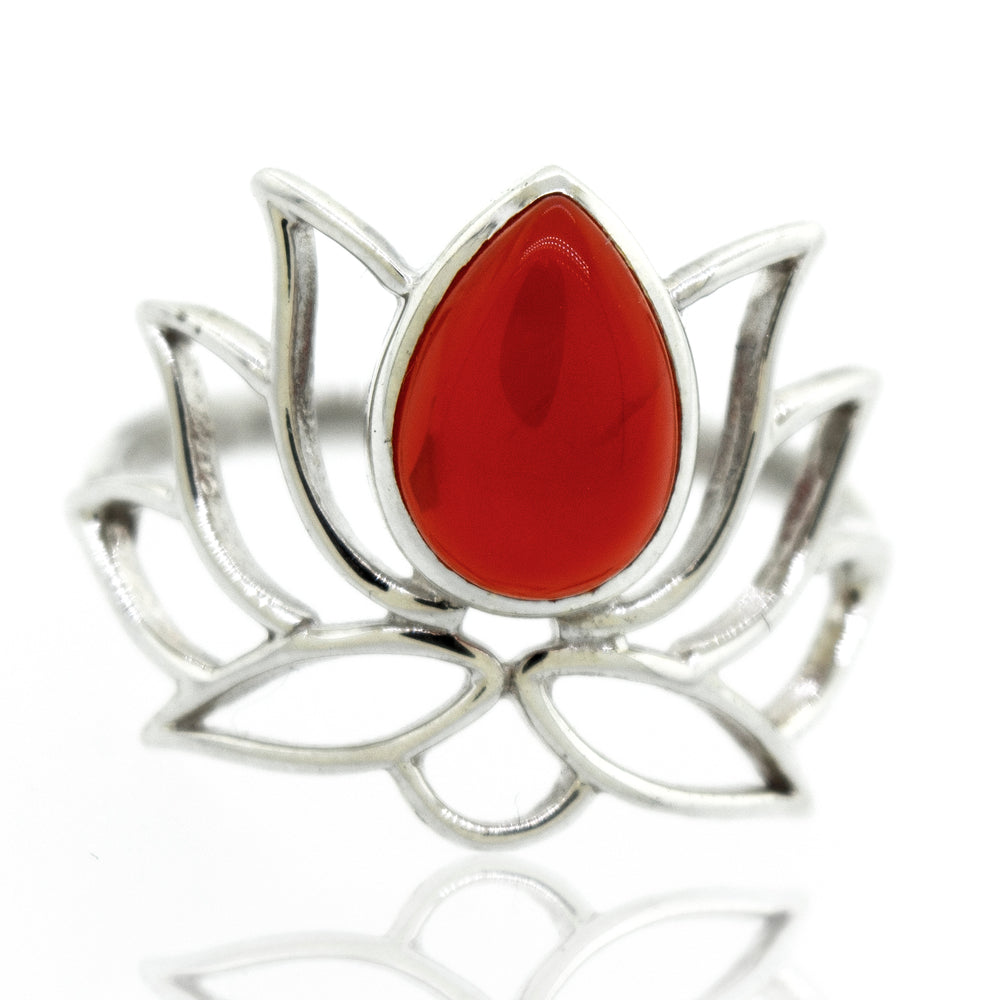 
                  
                    Online Exclusive Teardrop Stone Lotus Ring with a central red teardrop gemstone, presented on a white background.
                  
                