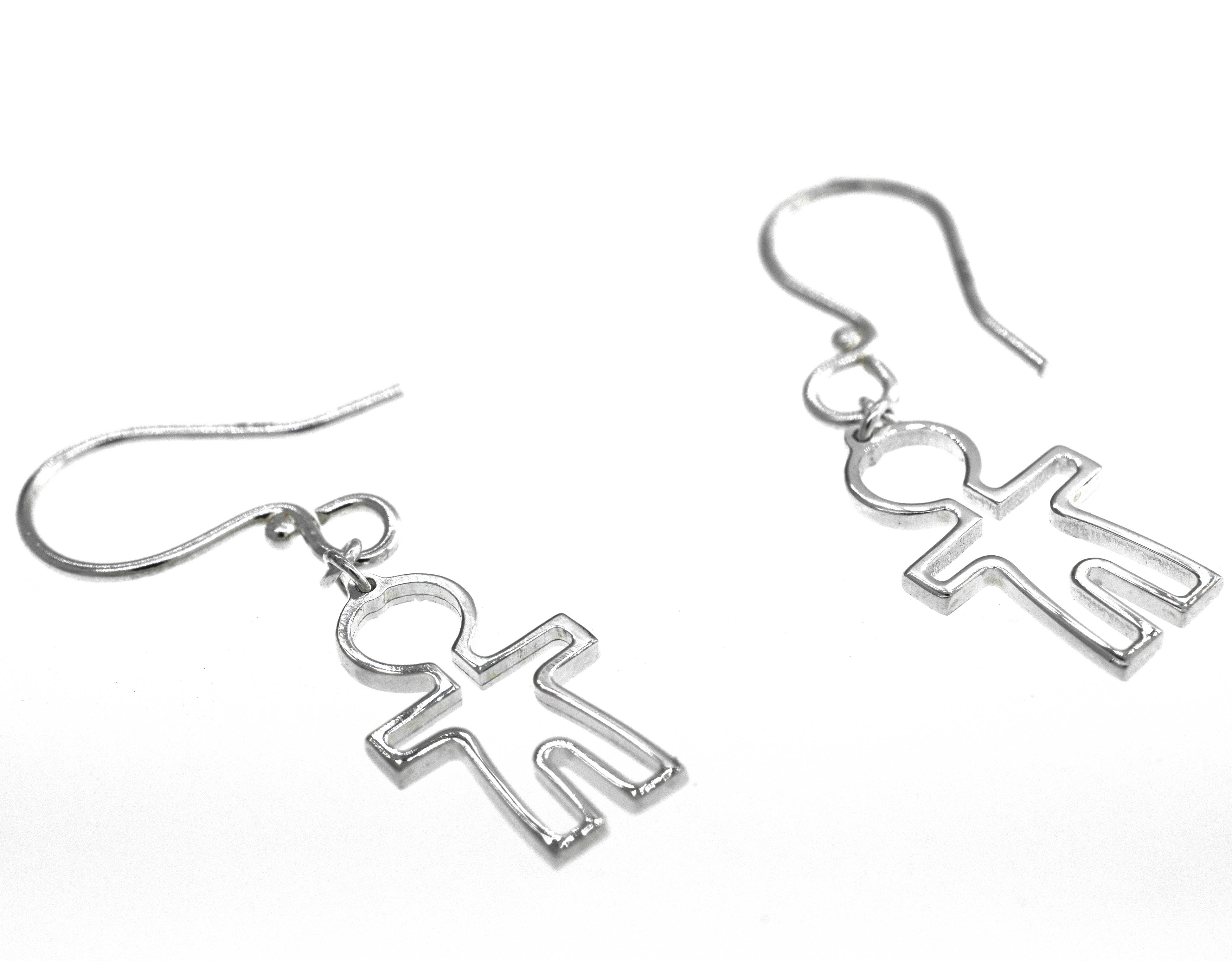 Adorable Little Man Shaped Earrings by Super Silver with little people designs.