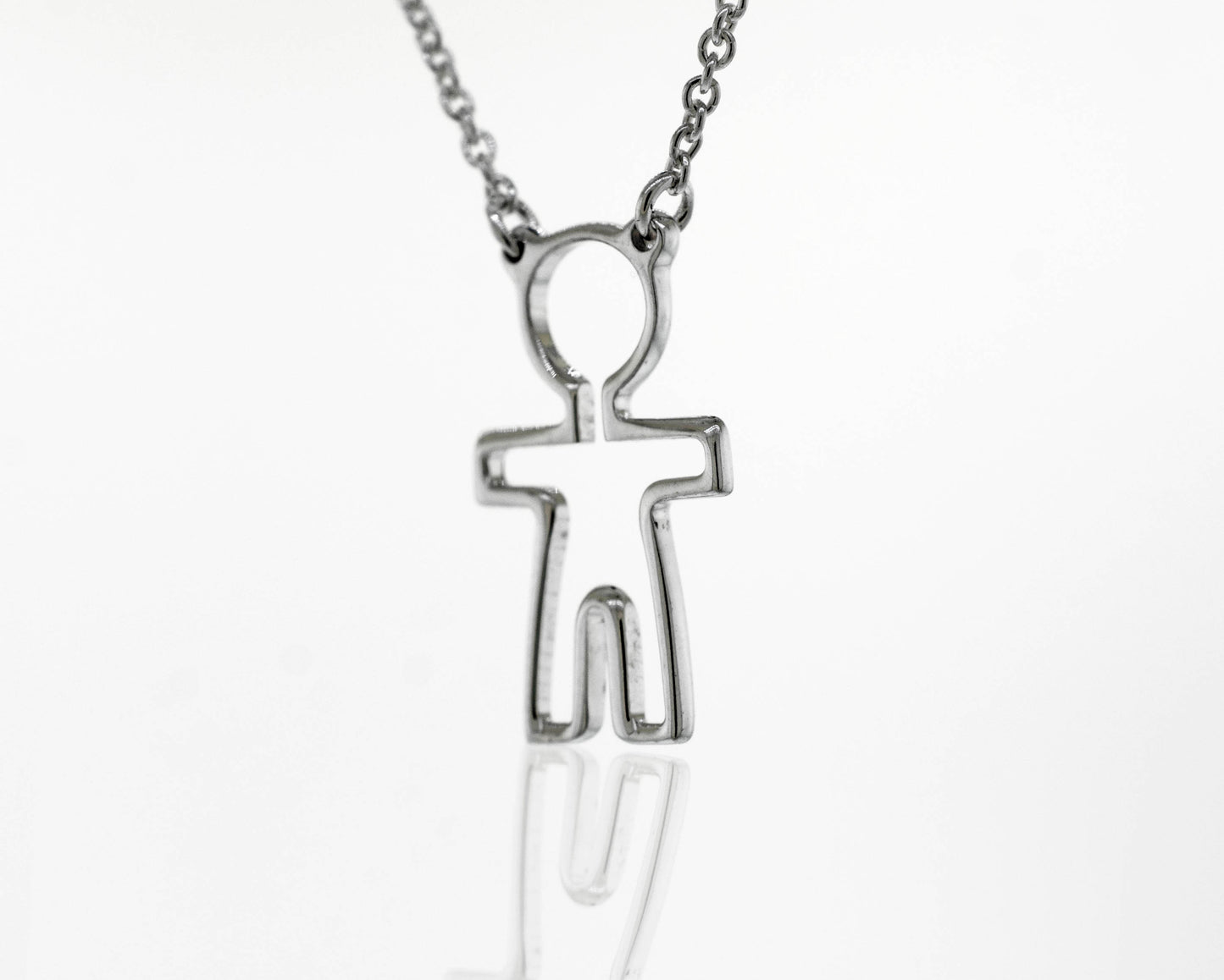 A Super Silver Little Woman Necklace adorned with a delicate figure, symbolizing love and humanity.