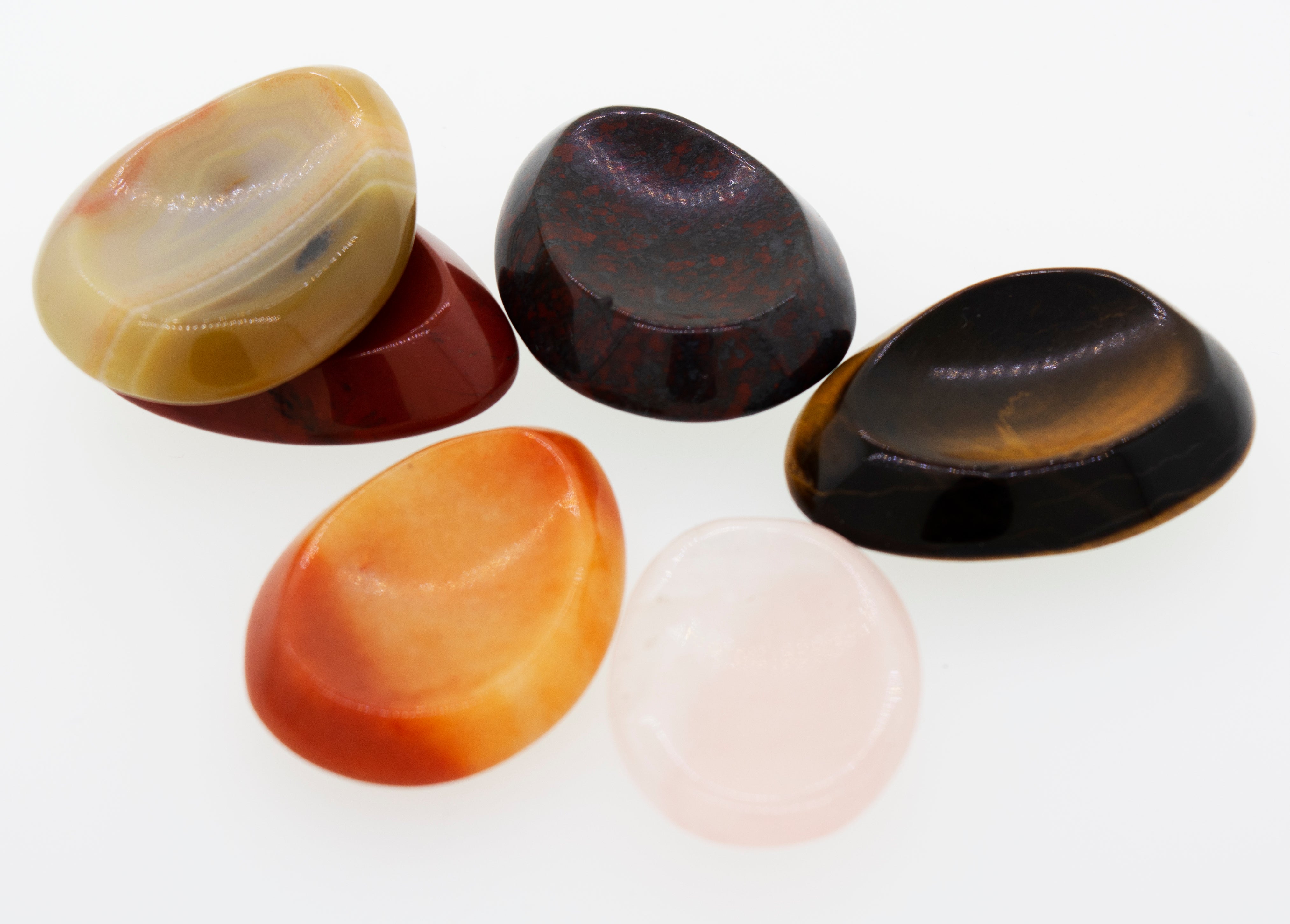 A crystal and worry stone fidget group on a white background.