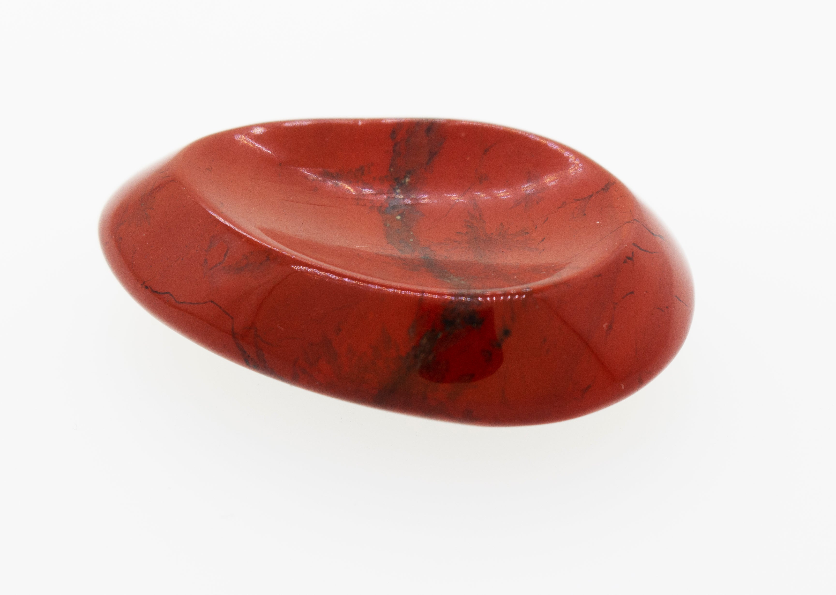 A Worry Stone on a white surface.