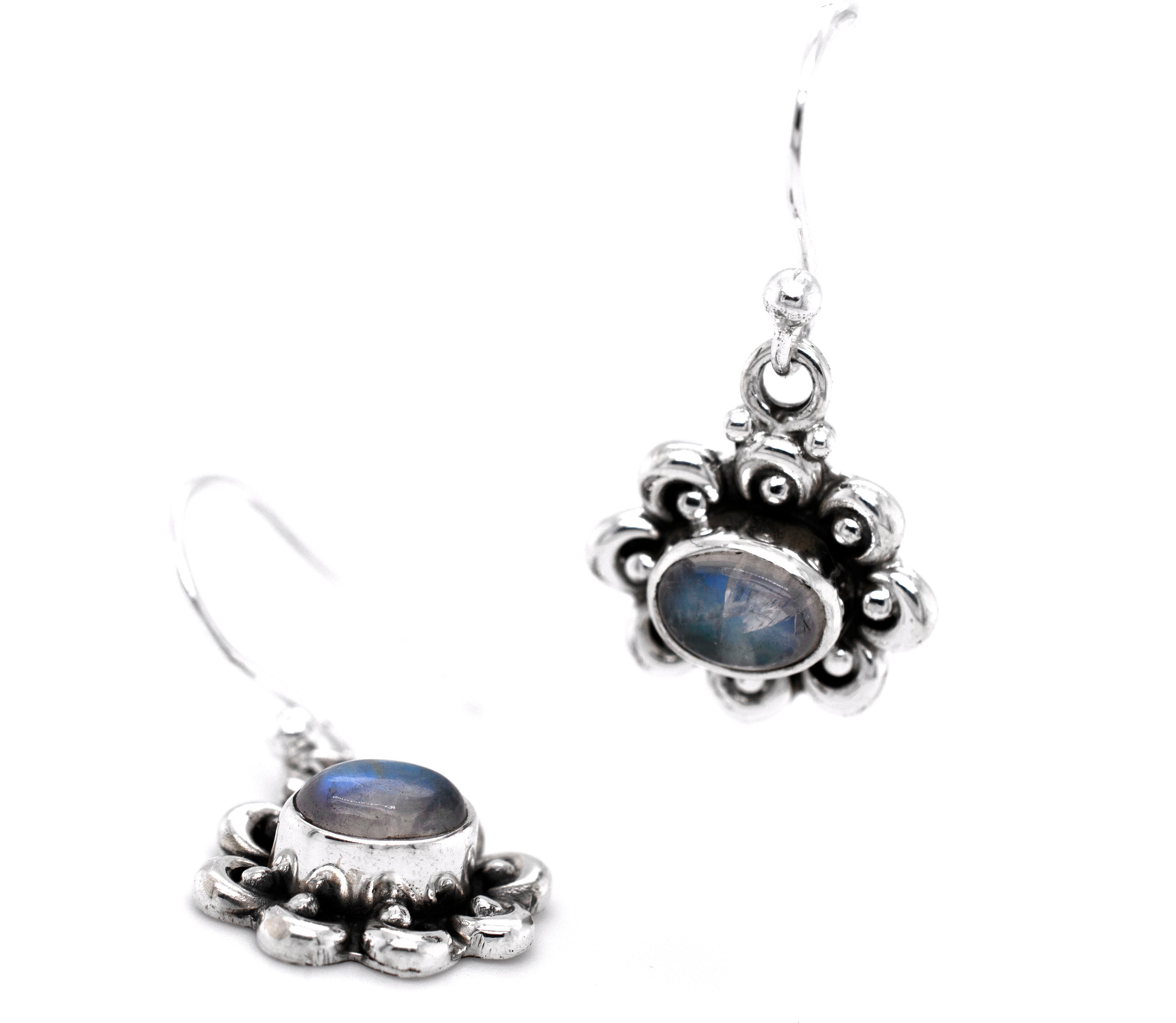 A pair of Darling Floral Moonstone Earrings by Super Silver, perfect for nature-inspired jewelry enthusiasts.