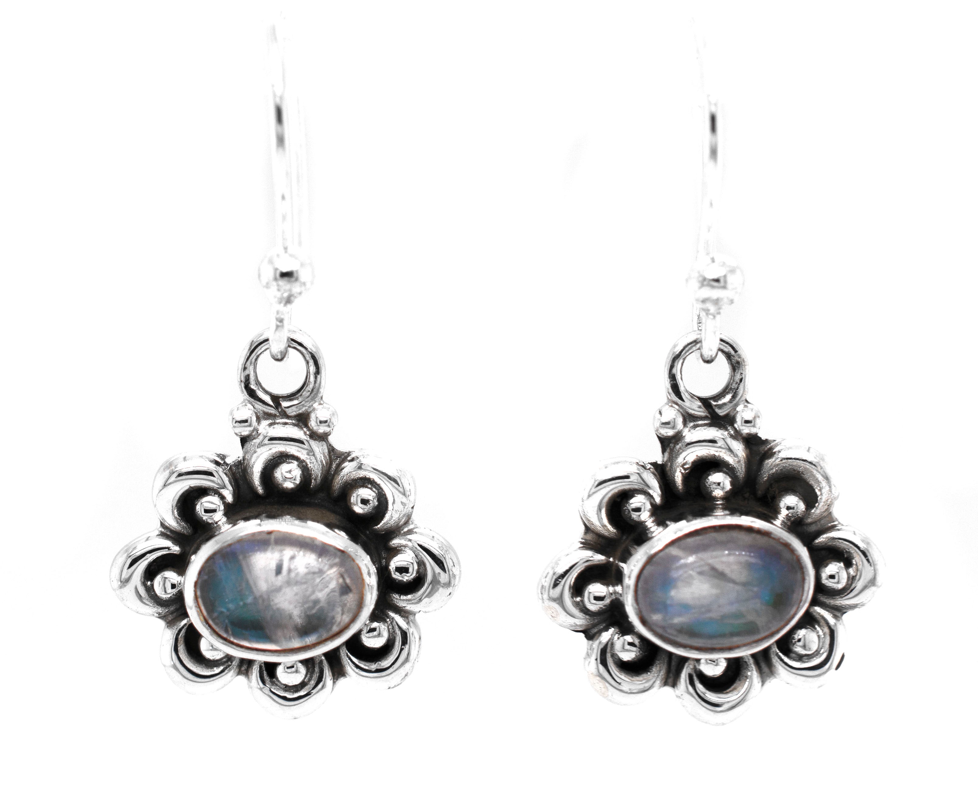 A pair of Darling Floral Moonstone Earrings by Super Silver, with a captivating labradorite stone.