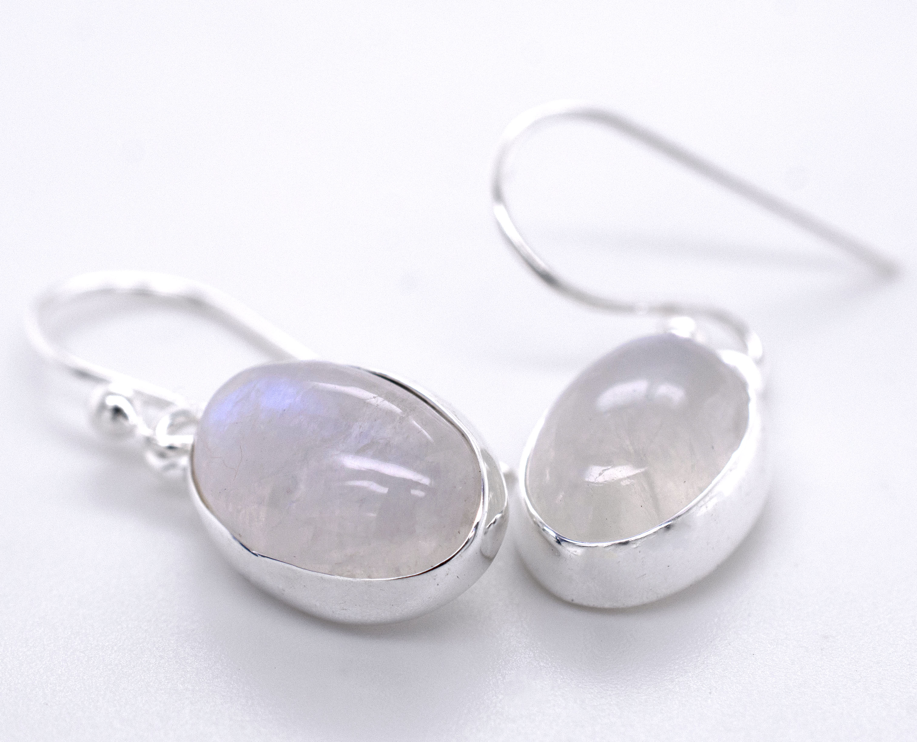 A pair of Super Silver Simple Oval Moonstone Earrings.
