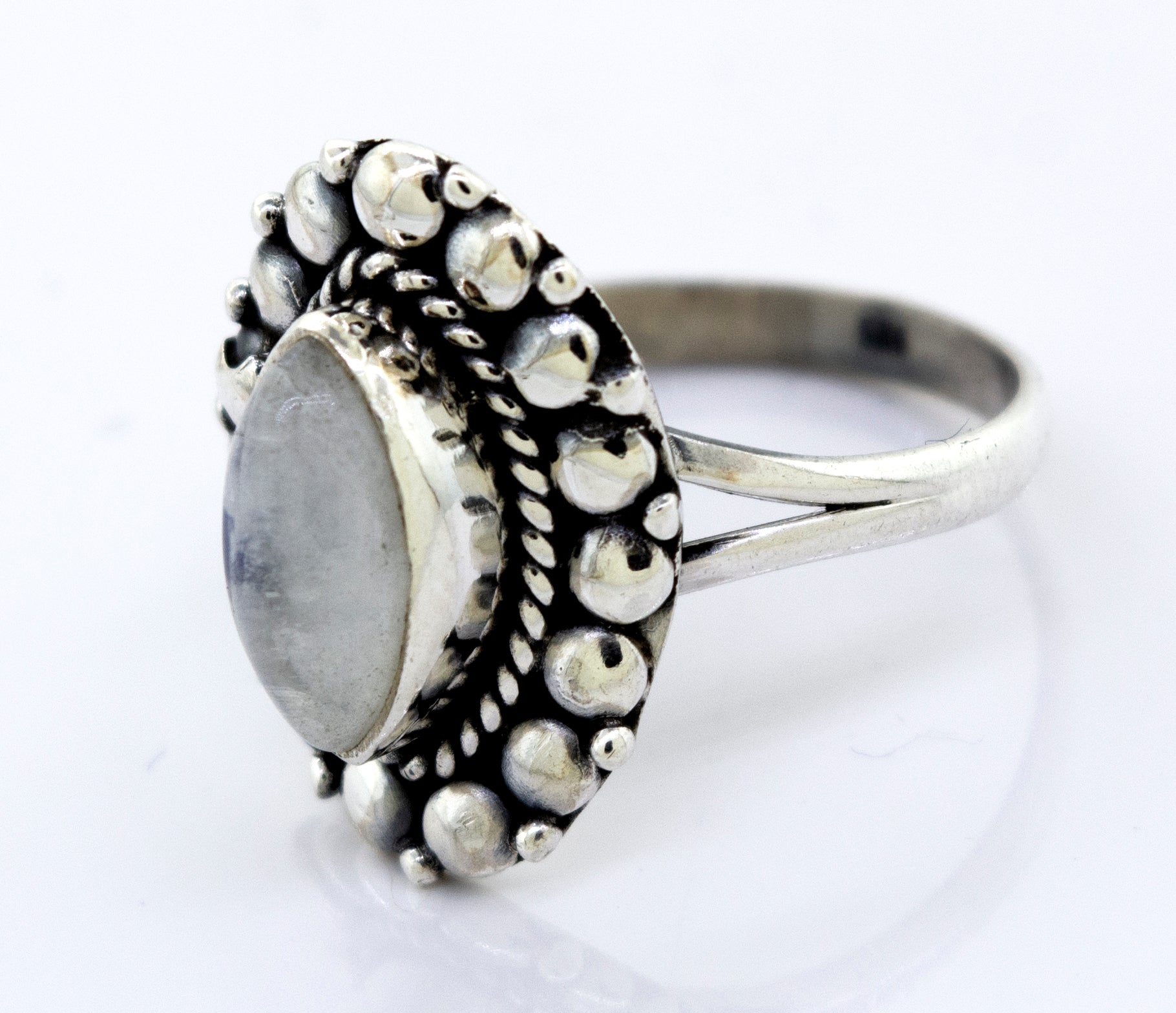 A Marquise Shaped Vibrant Moonstone Ring from Super Silver with a beaded design.