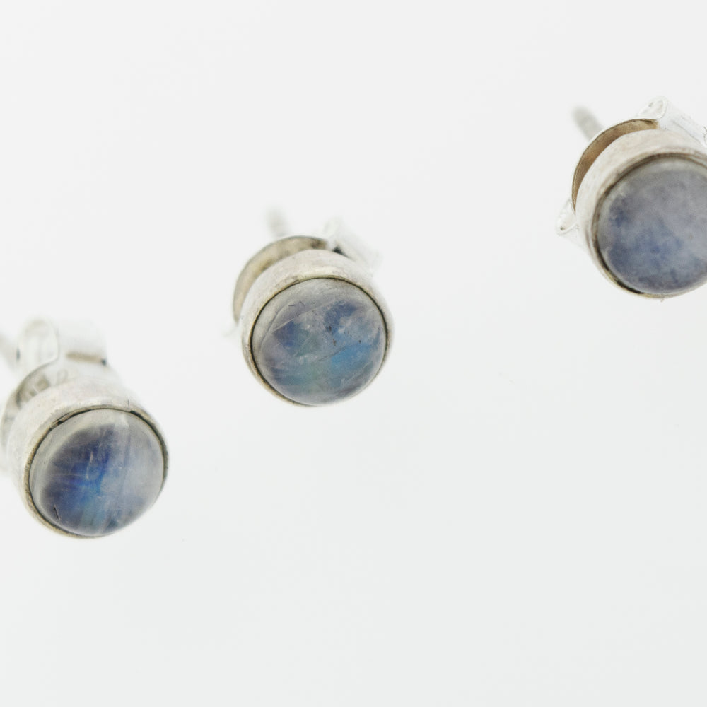 
                  
                    These Simple Circle Moonstone Studs by Super Silver feature a stunning blue stone, perfect for everyday wear.
                  
                