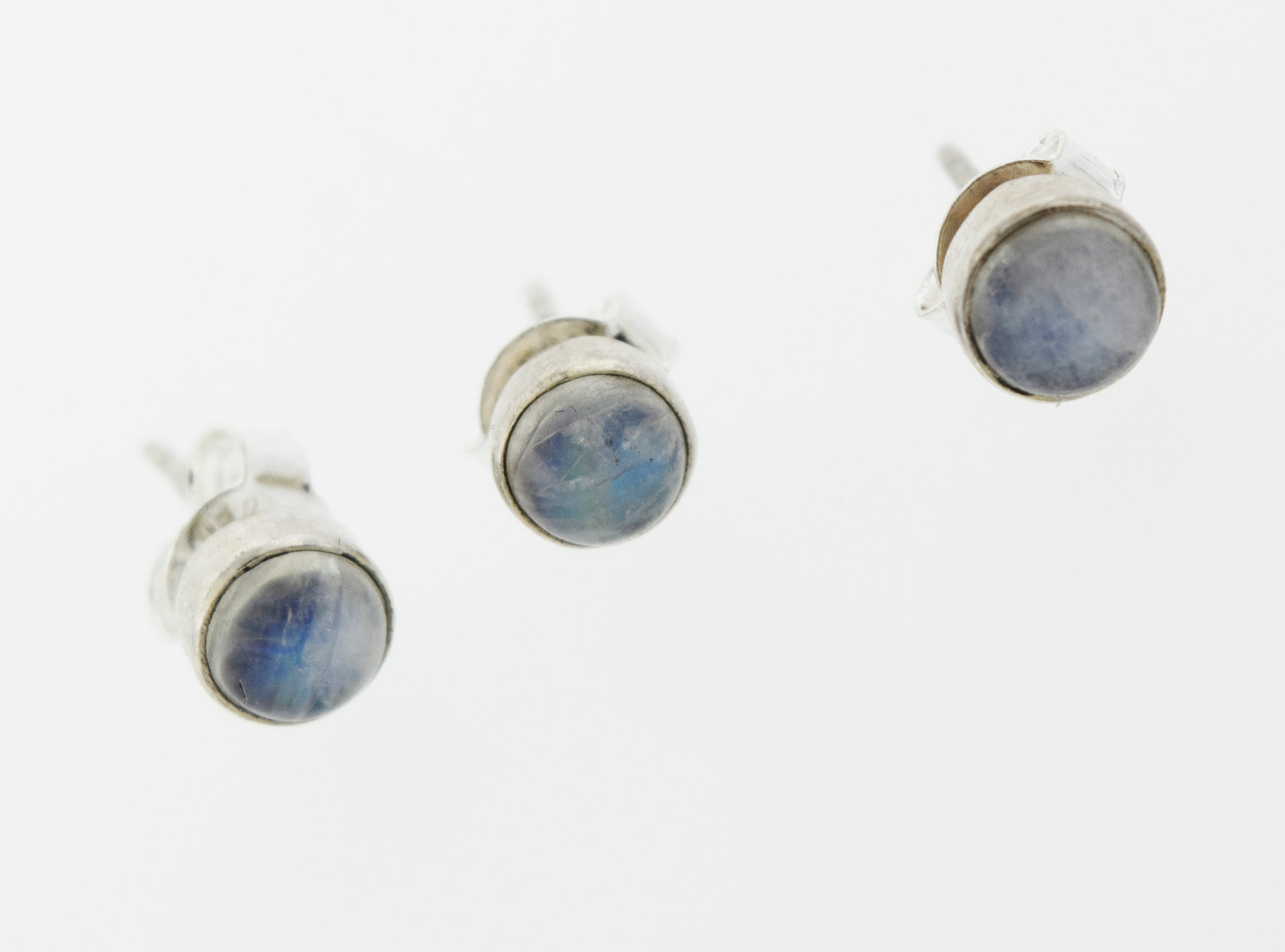 These Simple Circle Moonstone Studs by Super Silver feature a stunning blue stone, perfect for everyday wear.