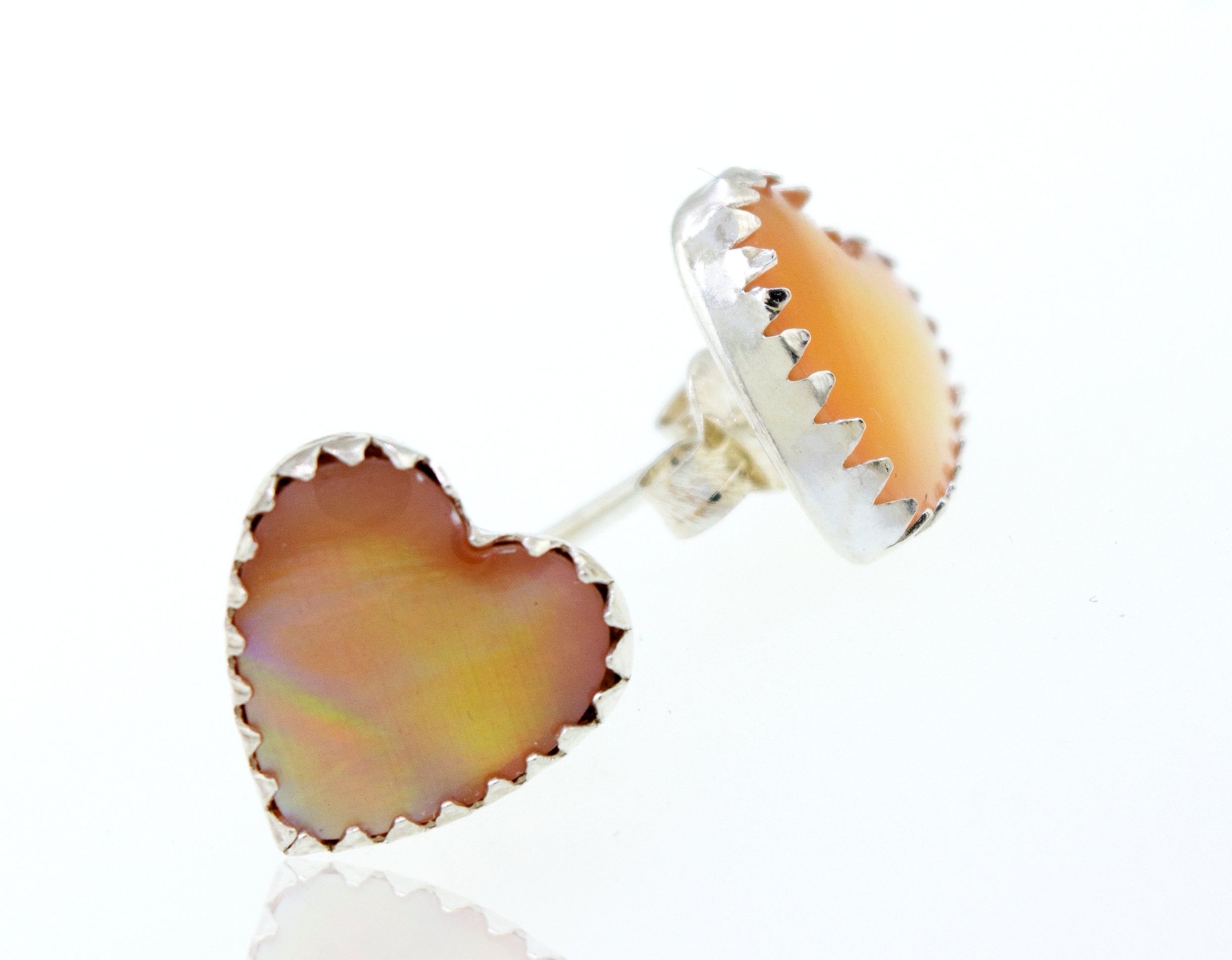 A pair of Super Silver American Made Mother of Pearl Heart Stud Earrings, crafted with Mother of Pearl, on a white surface.