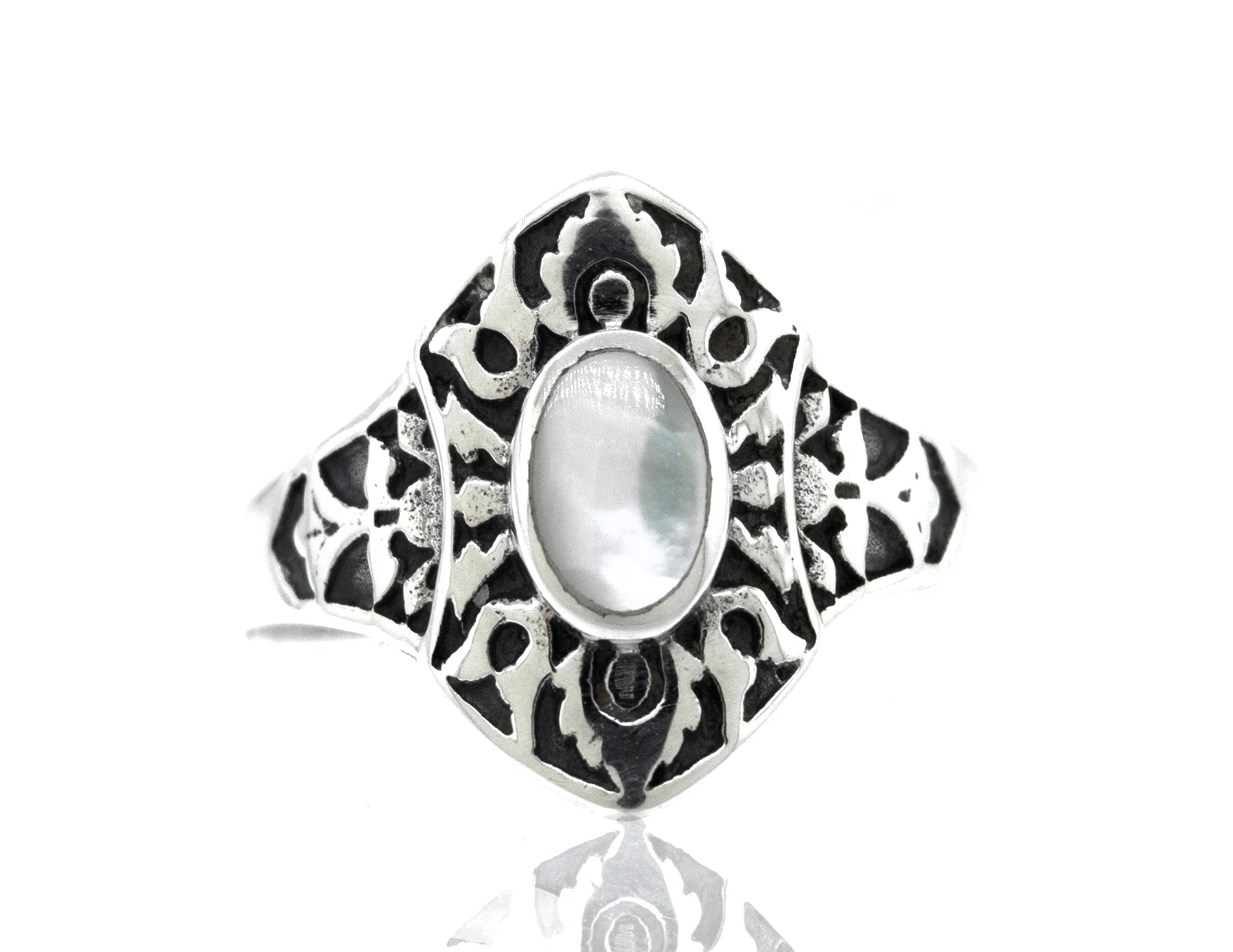 An ornate Super Silver Marquise Shield Ring With Inlaid Stones with an inlaid mother of pearl.