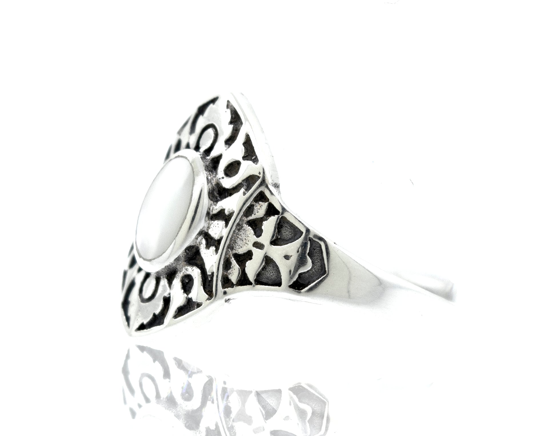 A Super Silver Marquise Shield Ring With Inlaid Stones, featuring a shield design.