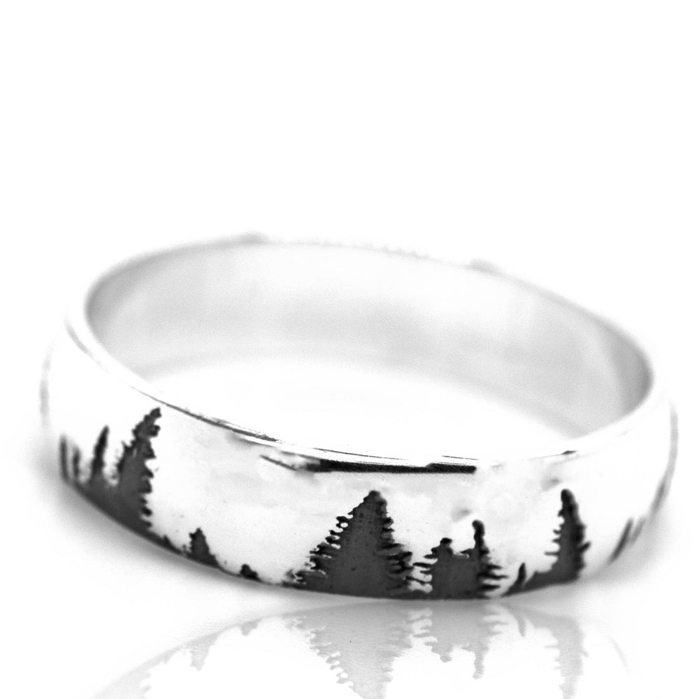 A Sleek Tree Band with a black and white image of trees.
