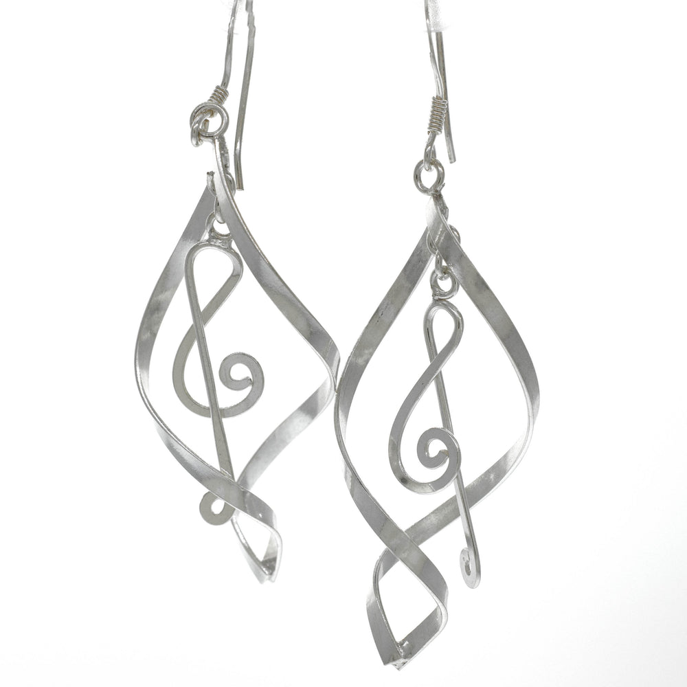 A pair of Striking Treble Clef earrings in .925 Sterling Silver by Super Silver.