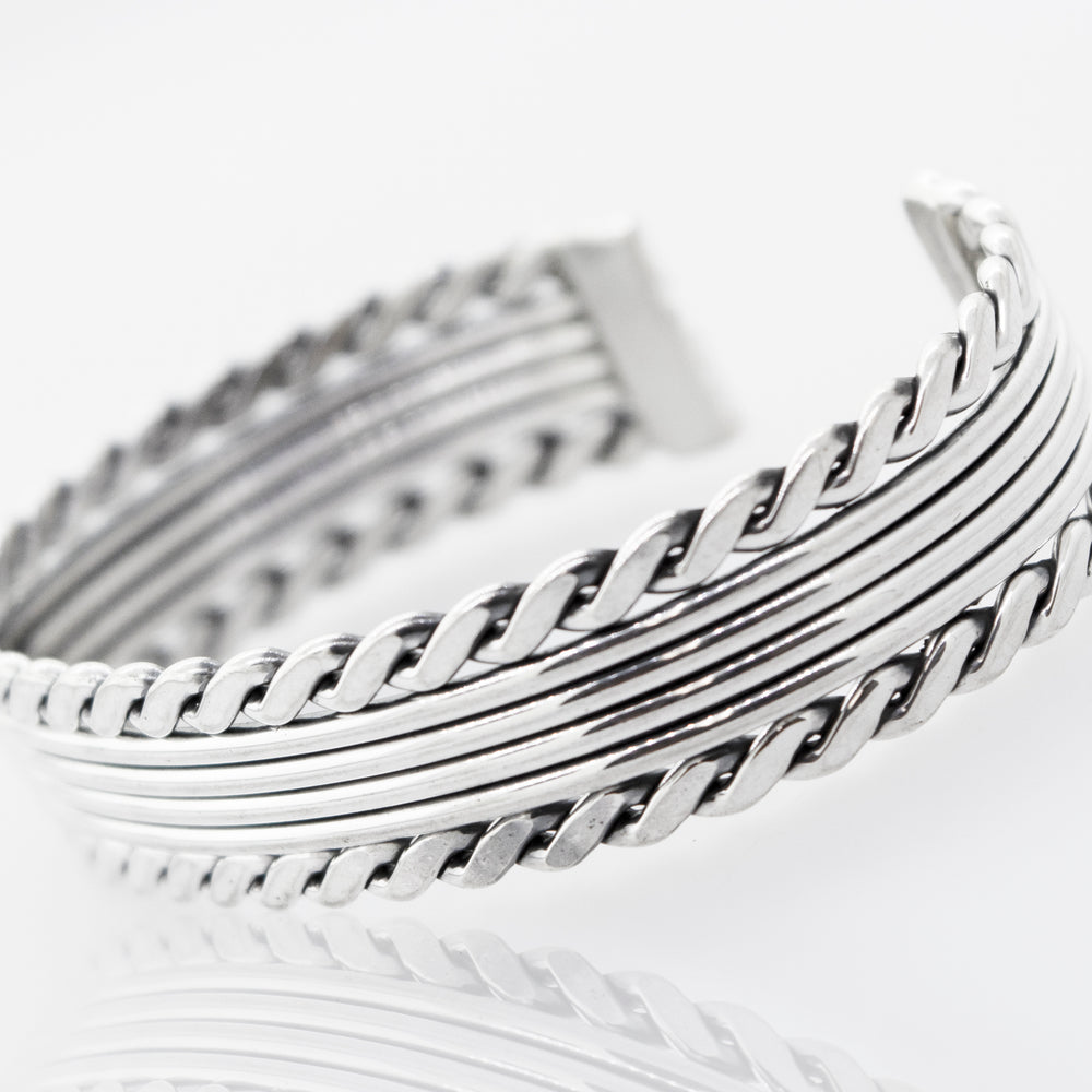 
                  
                    A 6-inch Native American Handmade Thick Silver Cuff with a Rope Border, made of .925 Sterling Silver by Super Silver.
                  
                
