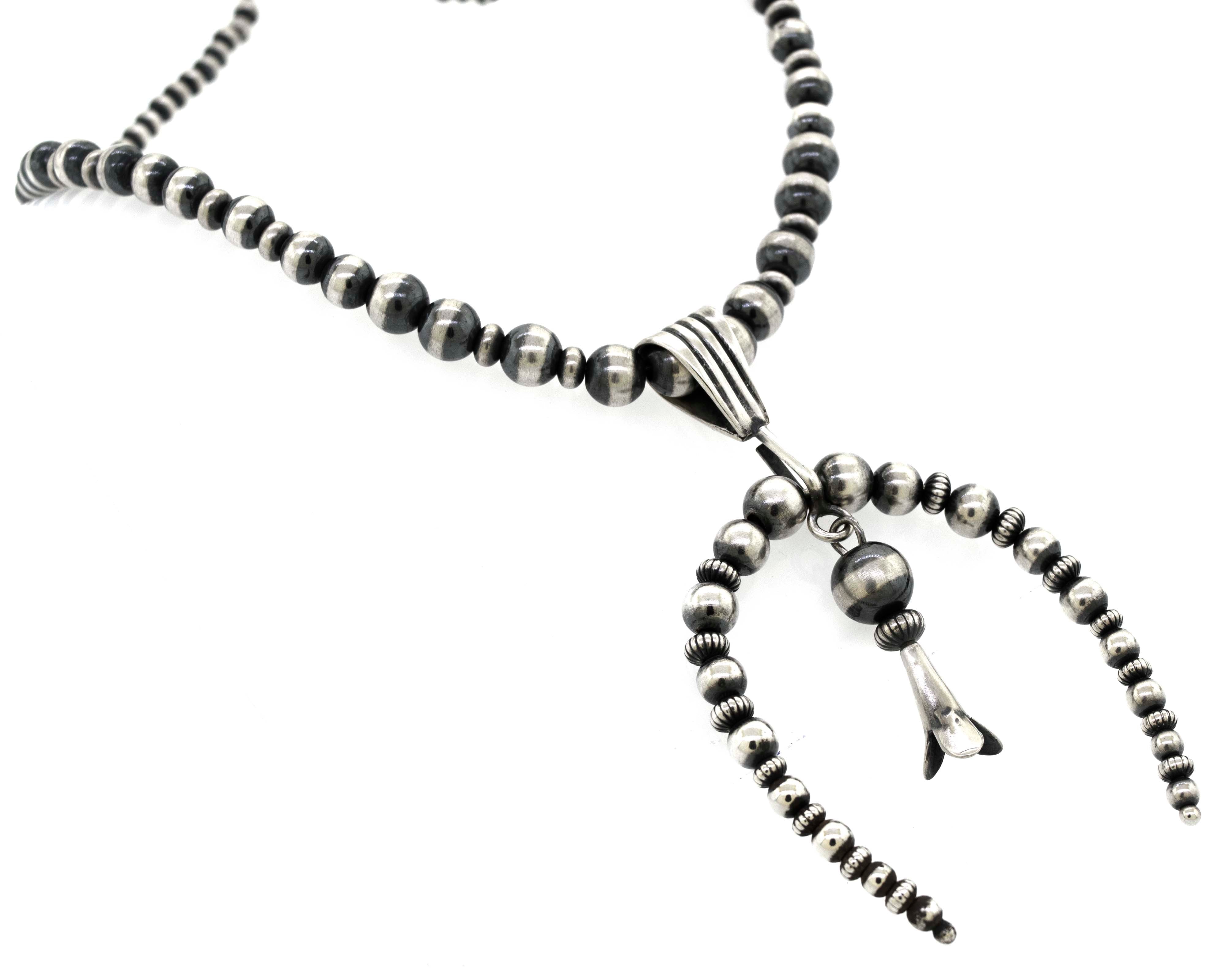 A Super Silver Handcrafted Naja Beaded Necklace, offering protection.
