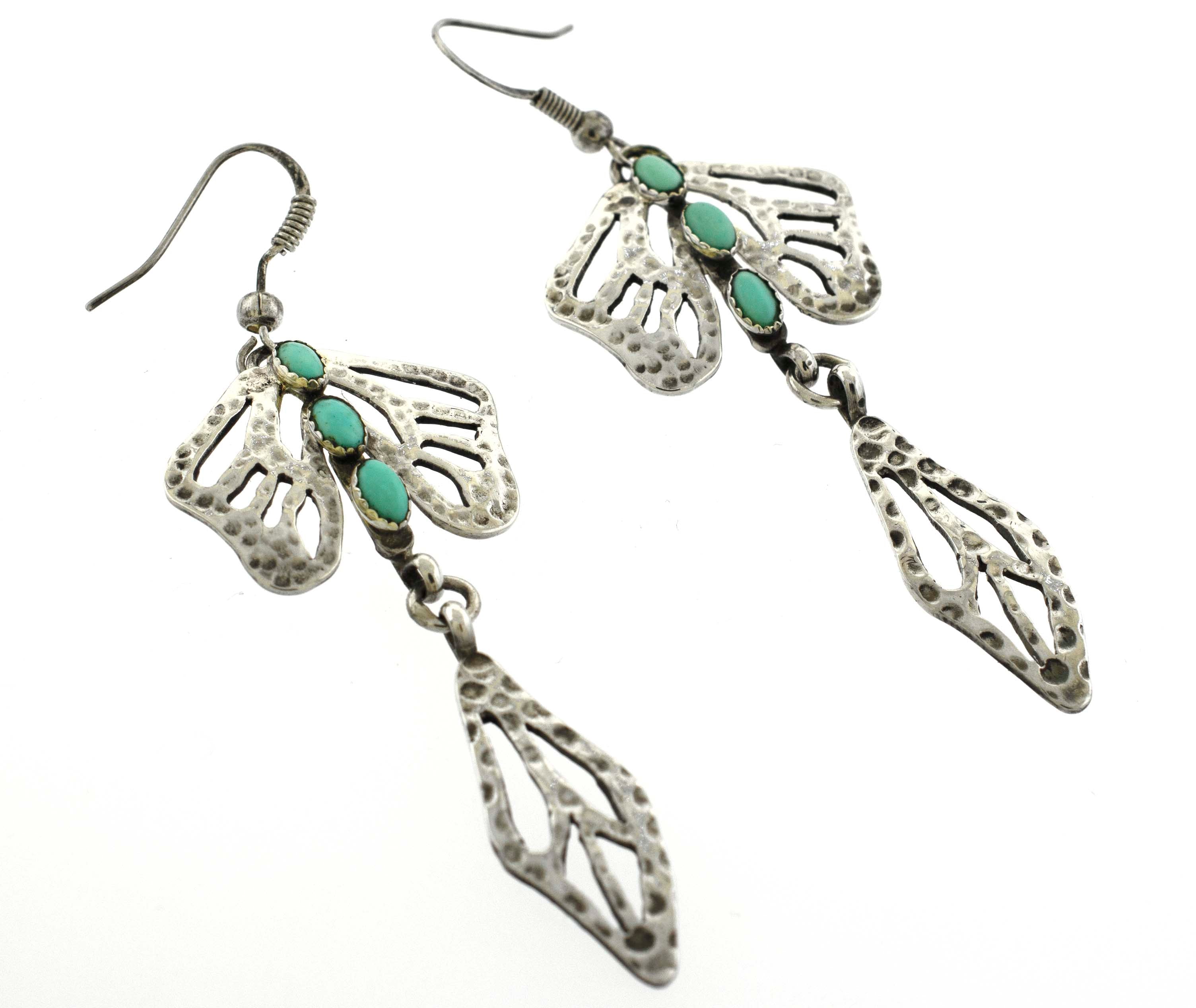 A pair of Super Silver earrings with handmade Turquoise Dragonfly Necklace And Earring Set.