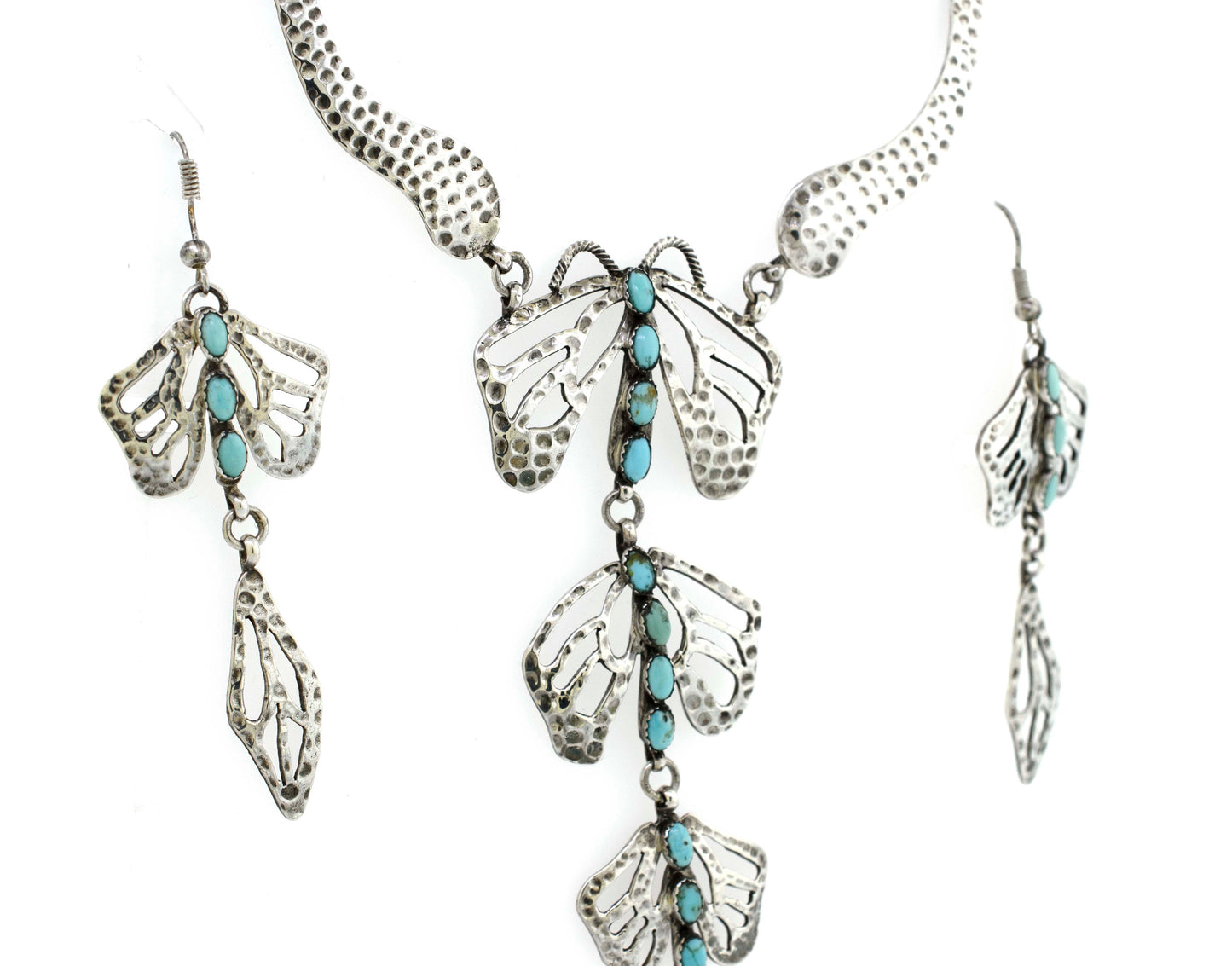 A Super Silver Handmade Turquoise Dragonfly Necklace And Earring Set with a touch of turquoise.