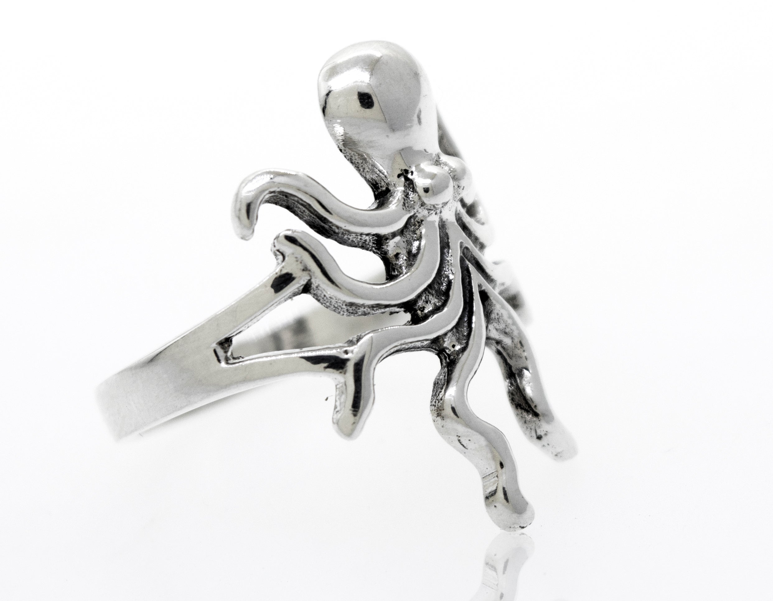 A high polish Super Silver sterling silver octopus ring on a white background.