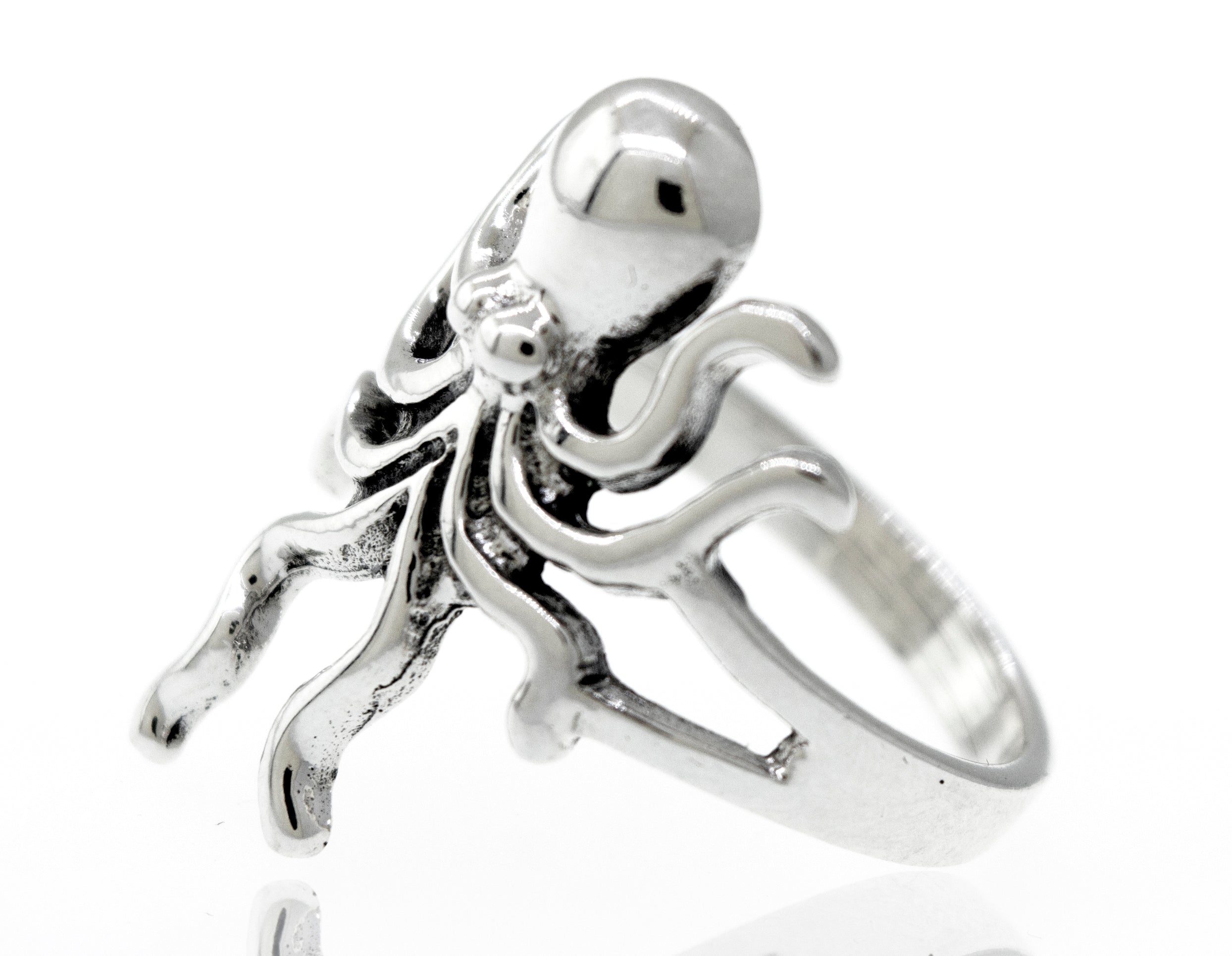 A high polish Super Silver sterling silver octopus ring on a white background.