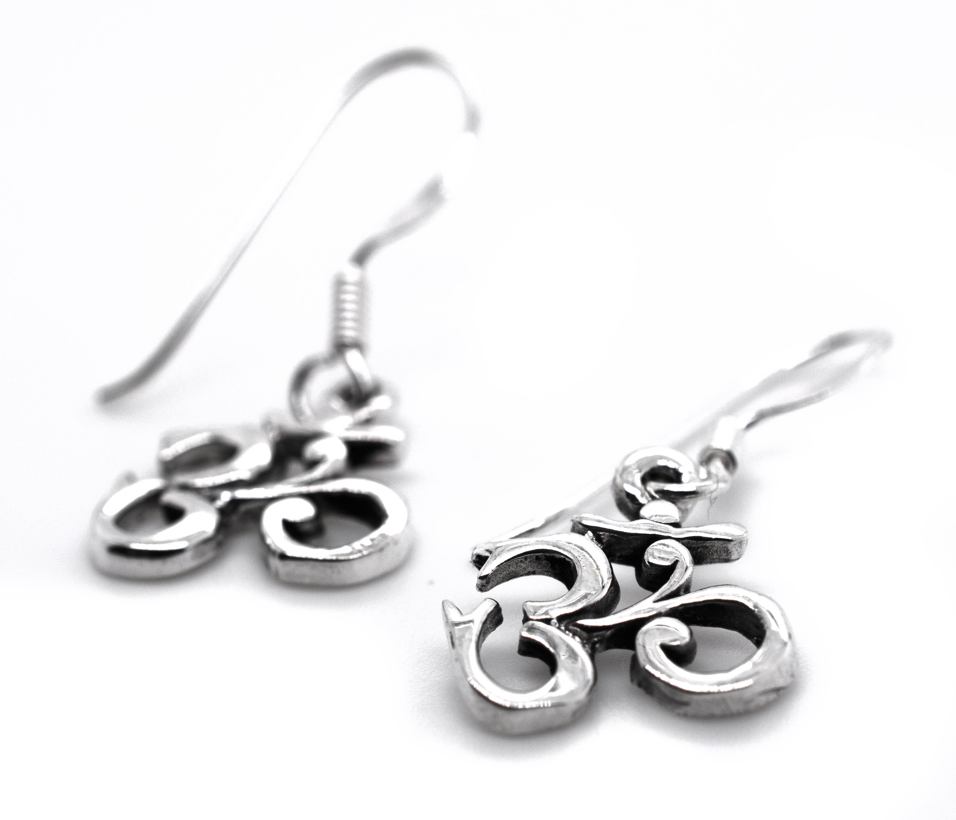 Seek fulfillment with these Dainty "Om" Earrings crafted in .925 sterling silver by Super Silver.