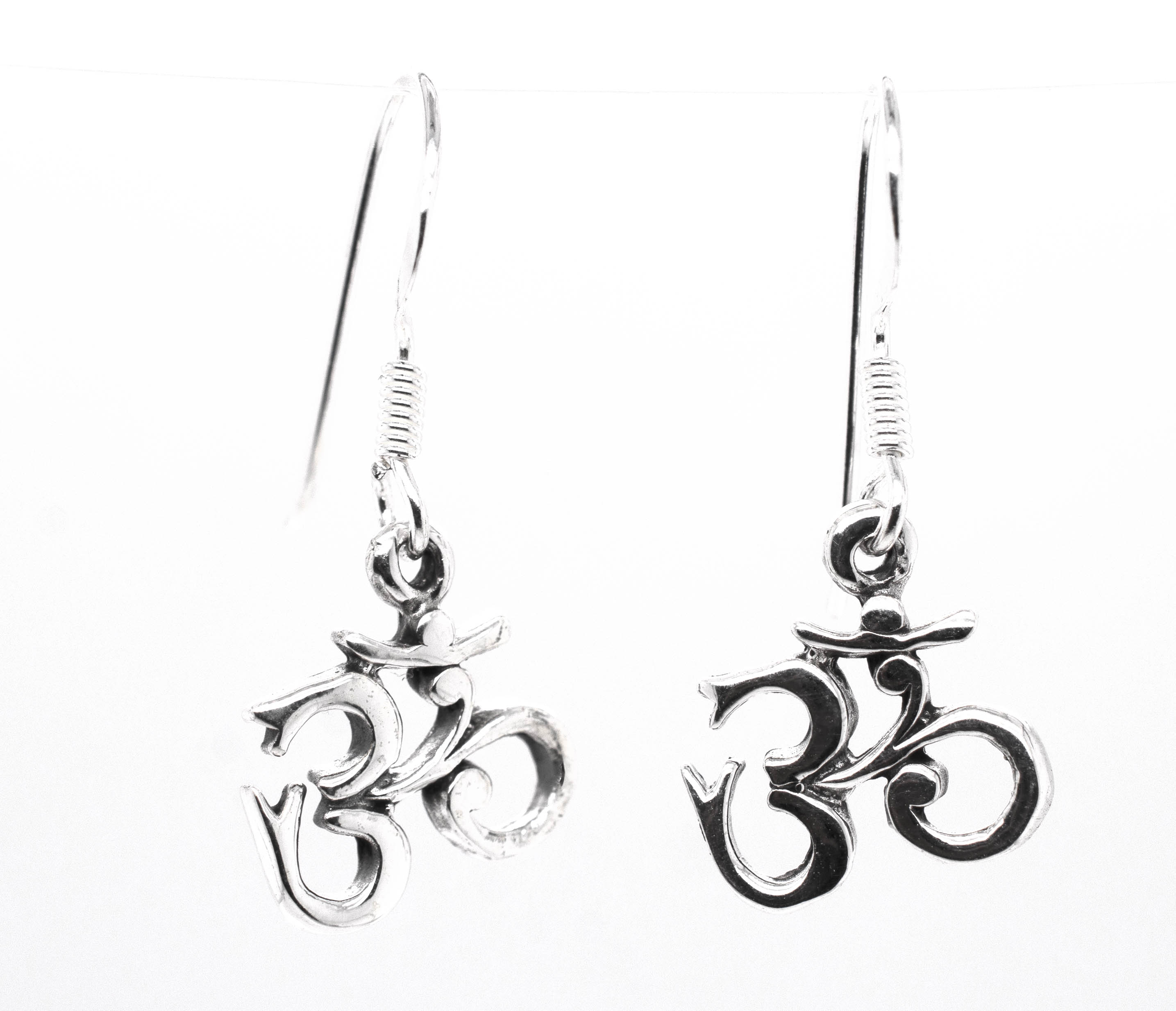 Seek fulfillment with these Dainty "Om" Earrings from Super Silver.