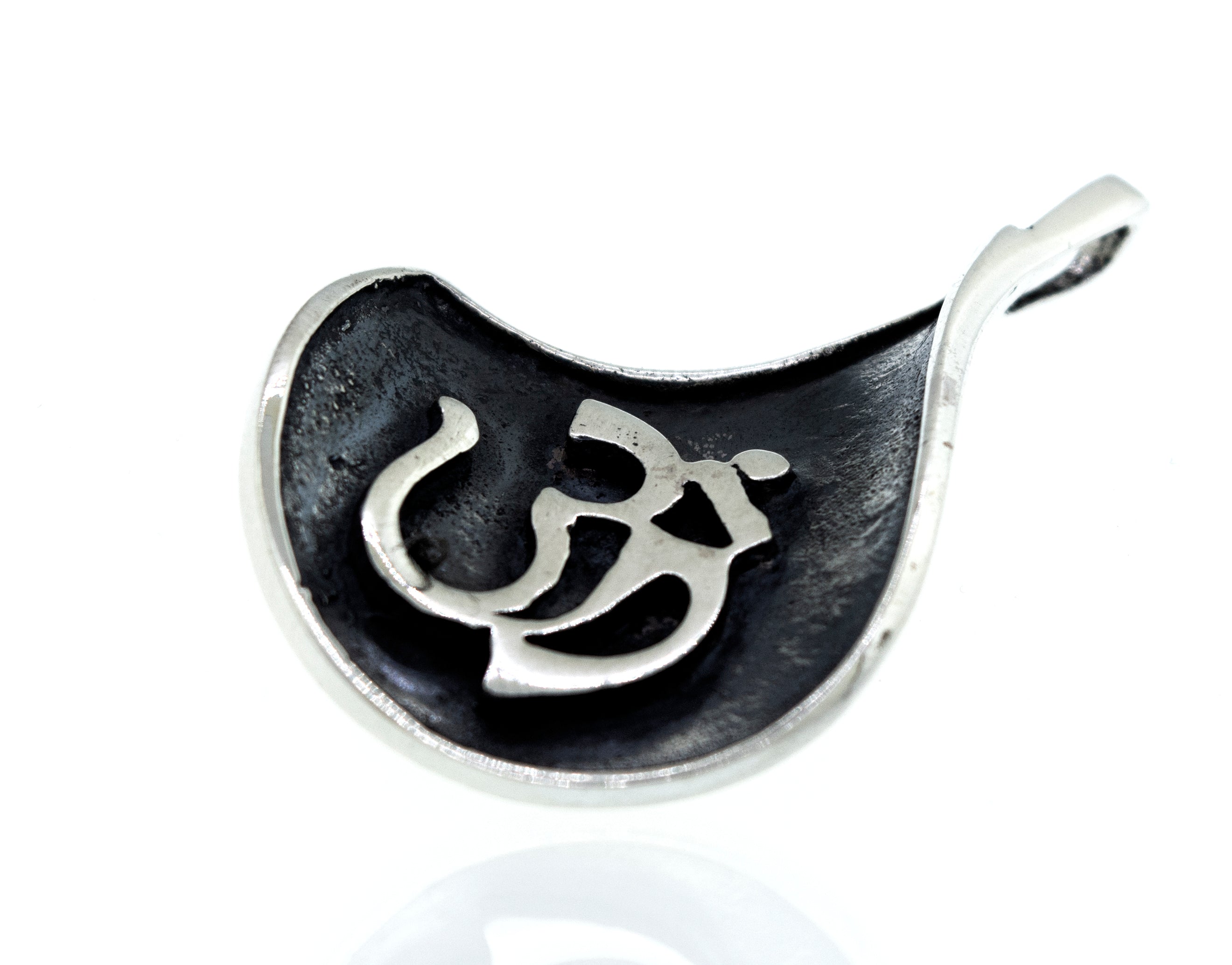A Super Silver Om Symbol Pendant.