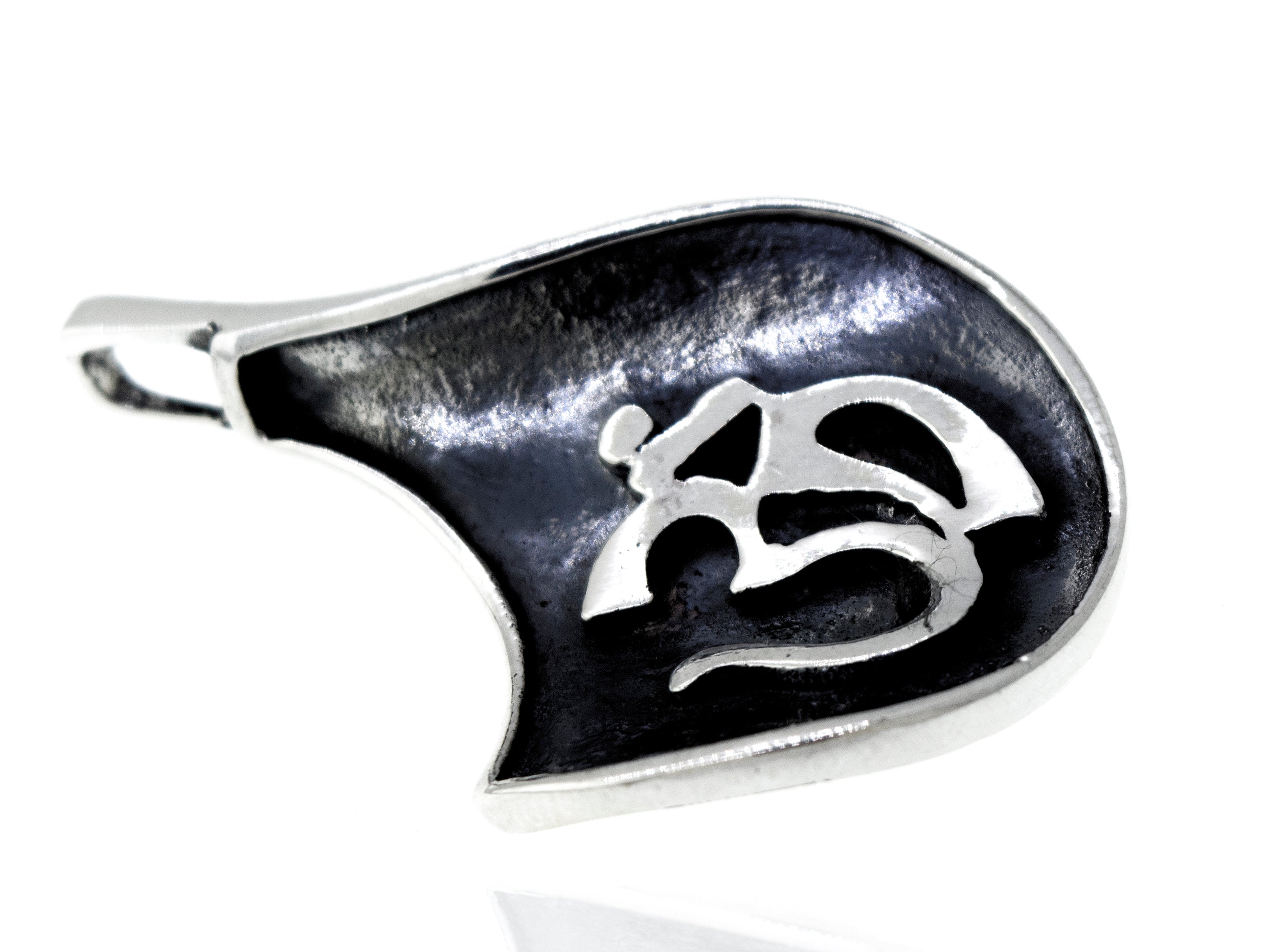 A Super Silver Om Symbol Pendant with an oxidized finish, crafted in sterling silver.