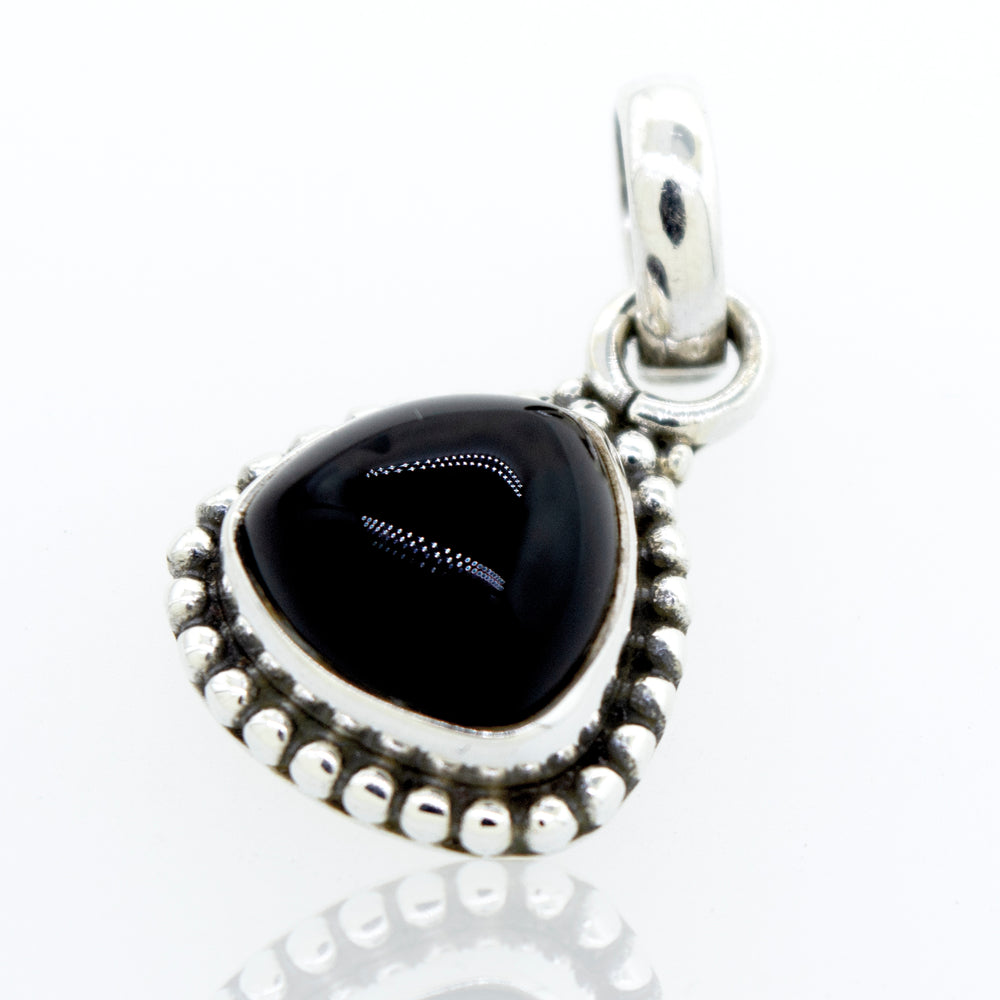 A Super Silver sterling silver pendant with a Beautiful Triangular Shape Onyx Pendant With Beads Design in a silver setting.