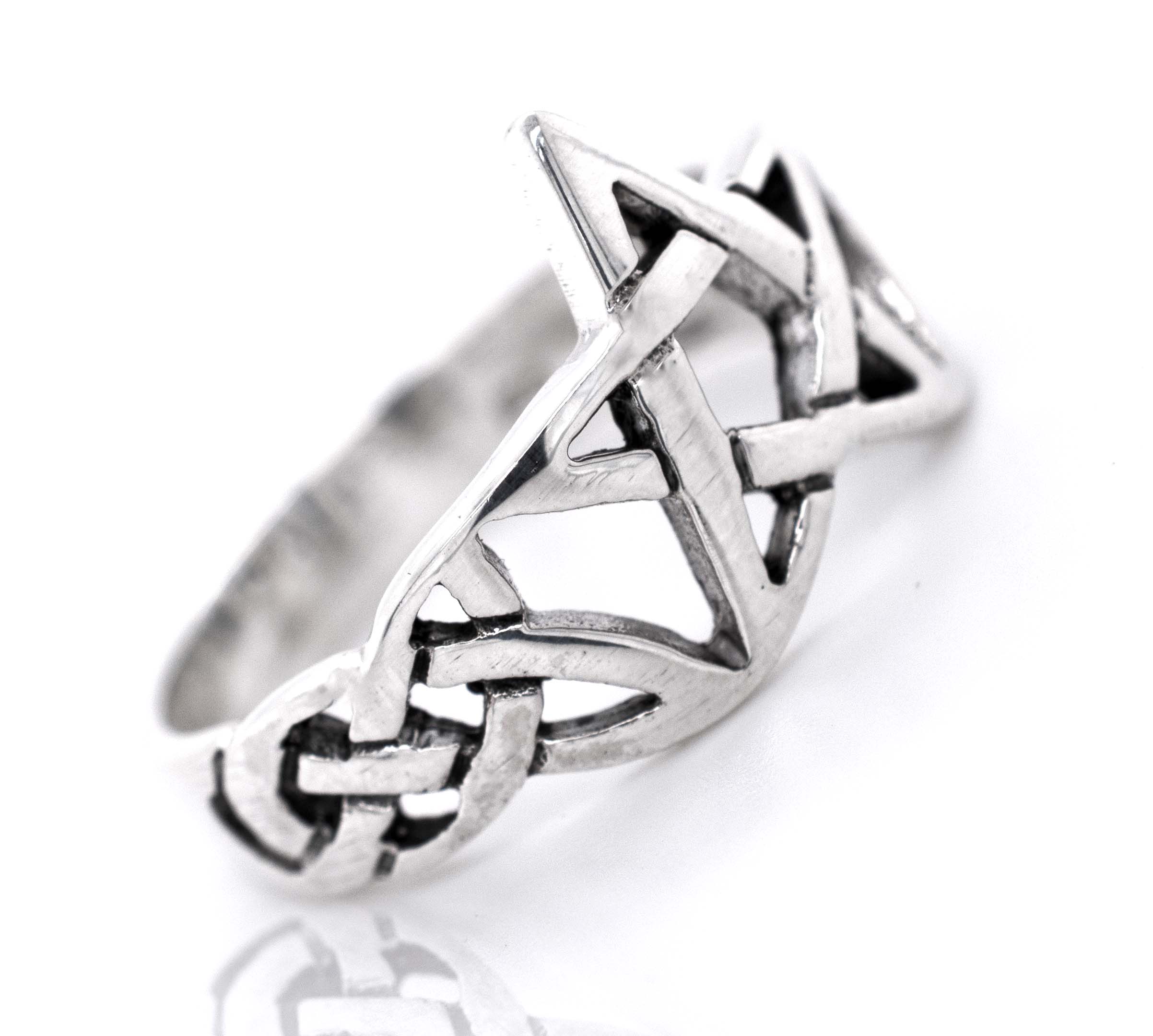 A sterling silver Pentagram With Celtic Knot Design Ring featuring a star.