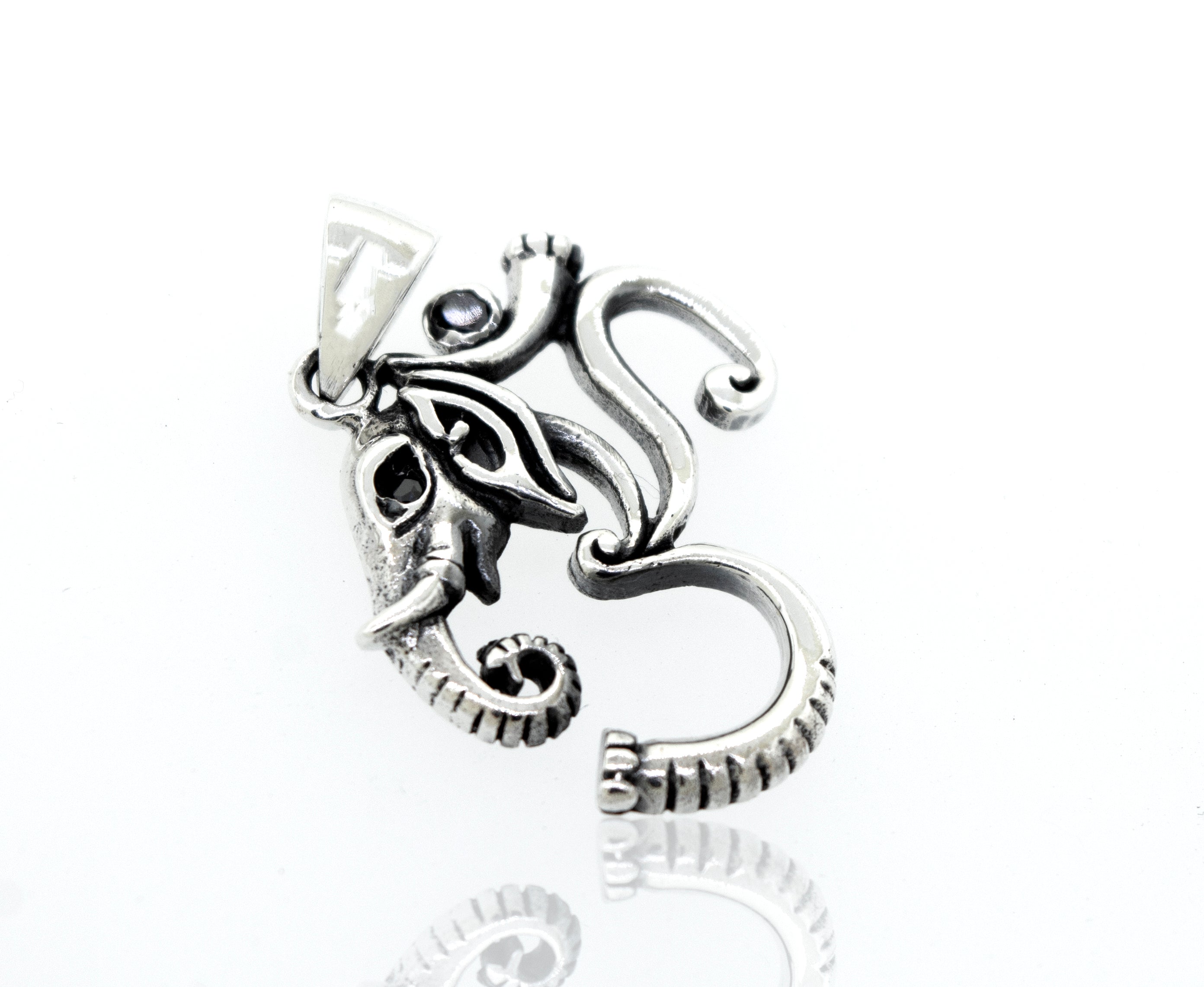 A Super Silver Om Pendant With Elephant Head Design.