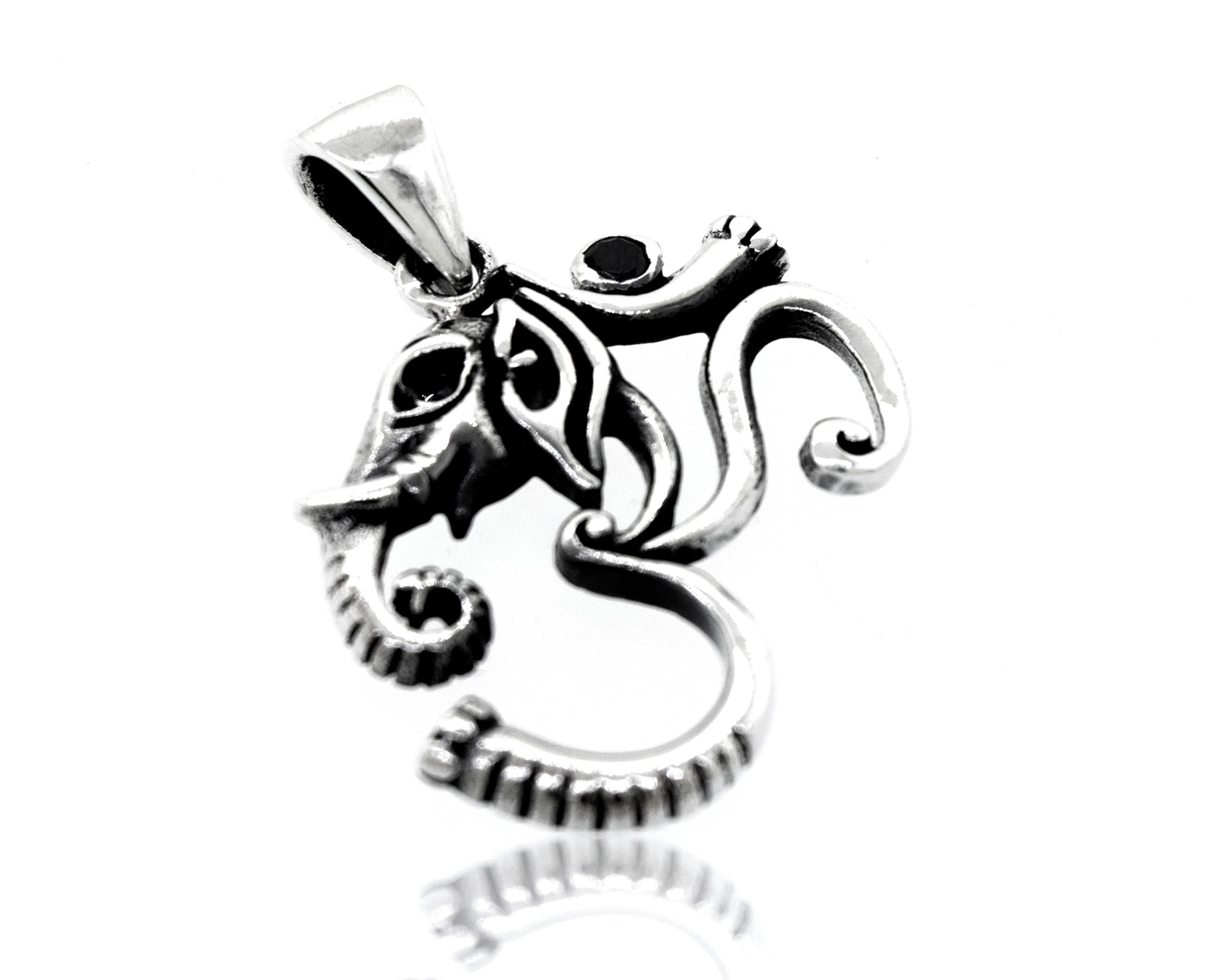 A Super Silver Om Pendant With Elephant Head Design.