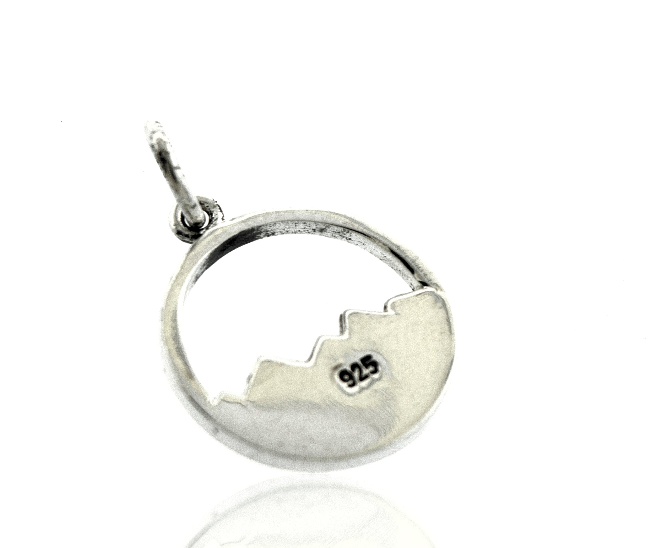 A high polish Super Silver Delicate Mountains Pendant.