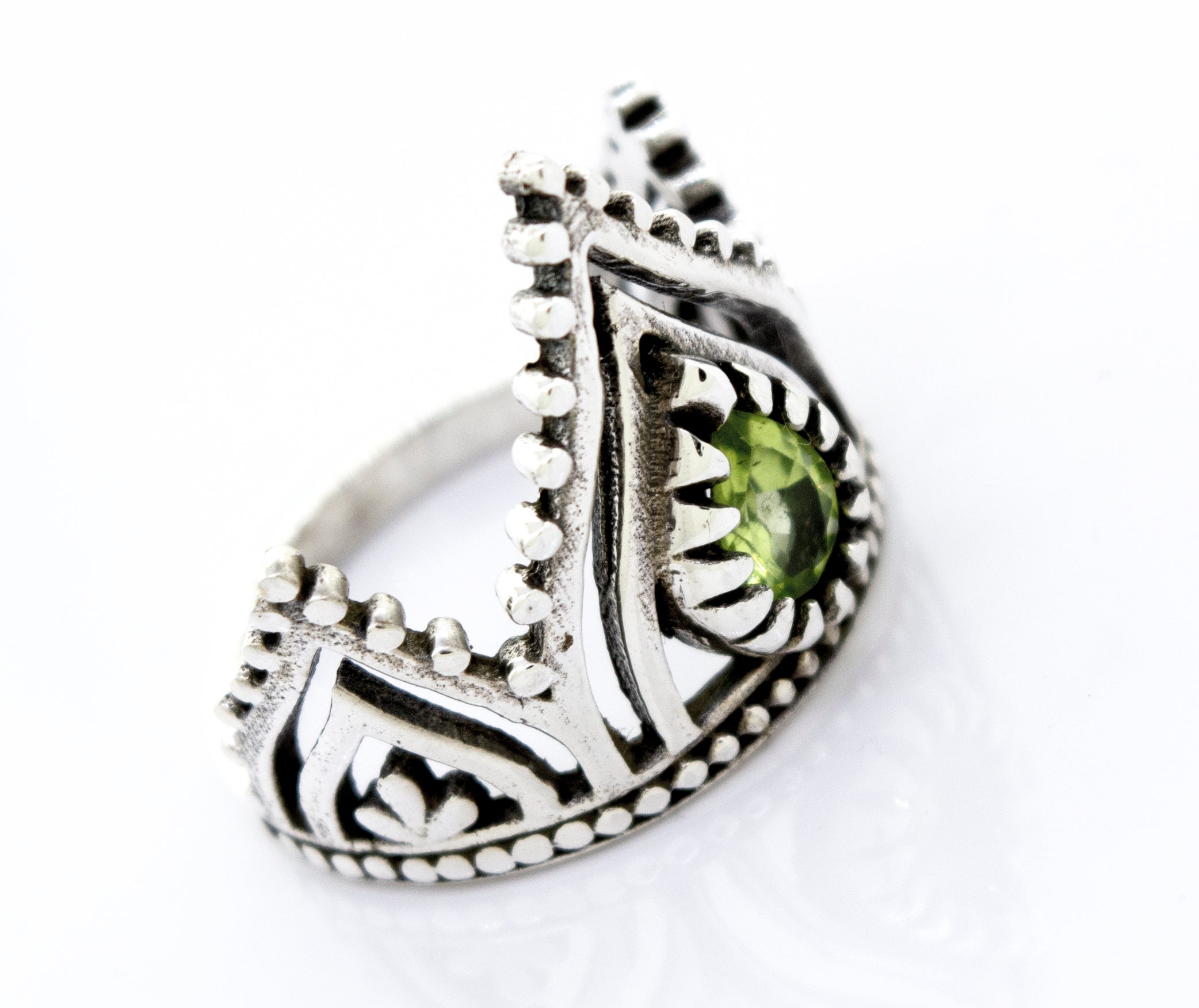 A Super Silver Crown Ring With Teardrop Shape Peridot.