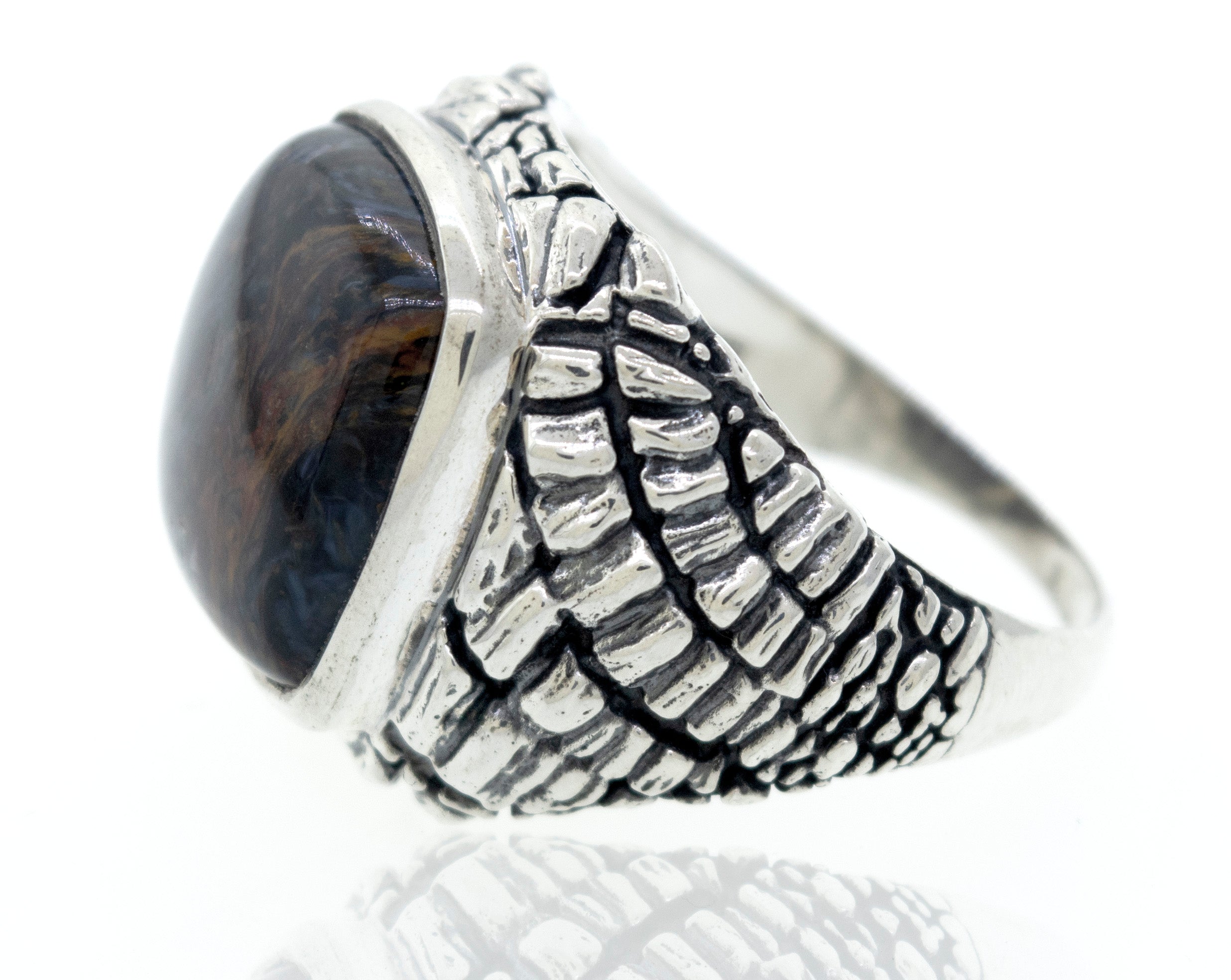 A Pietersite Signet Ring with a tiger eye stone.