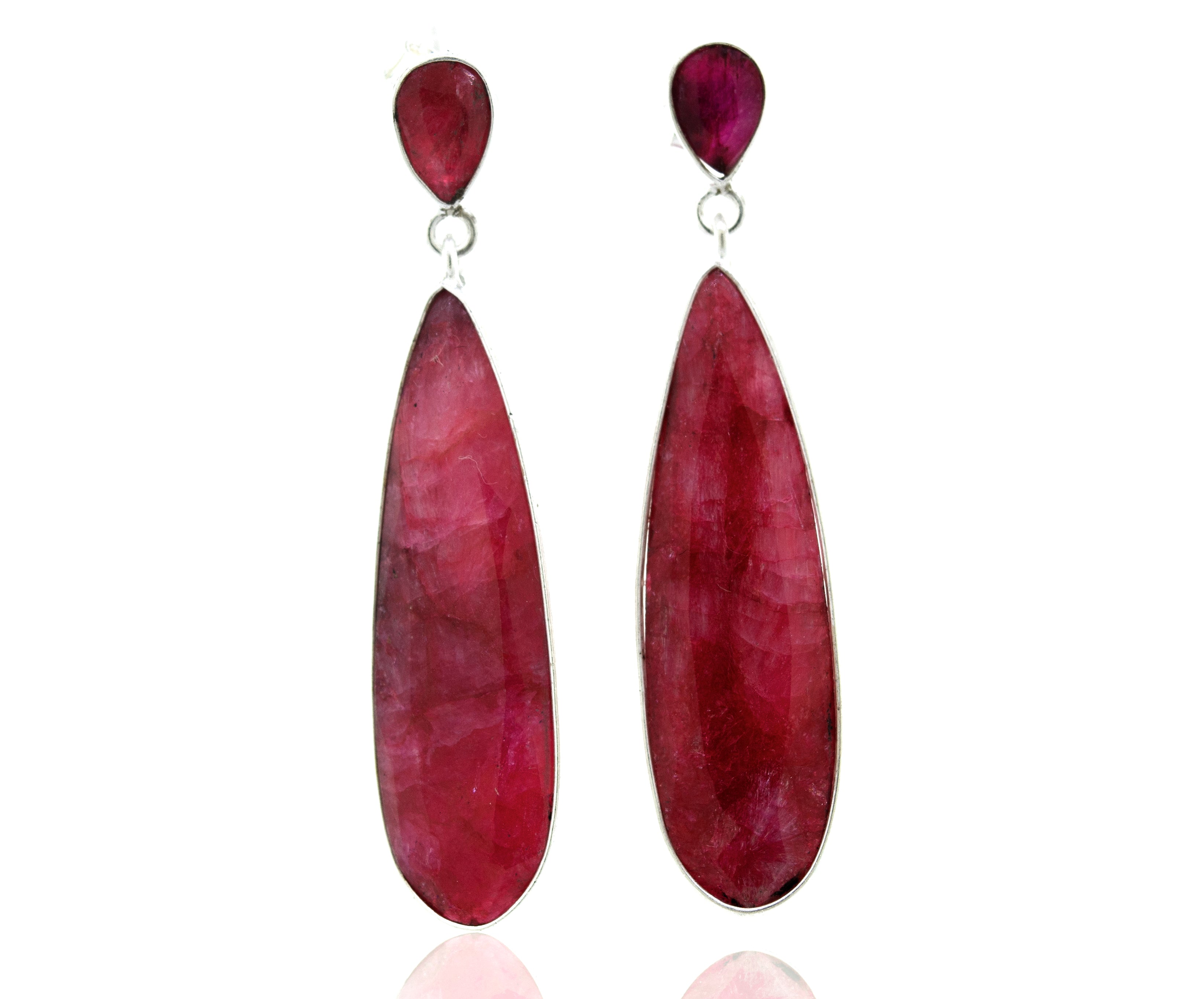 A pair of Super Silver Vibrant Teardrop Shape Ruby Earrings.