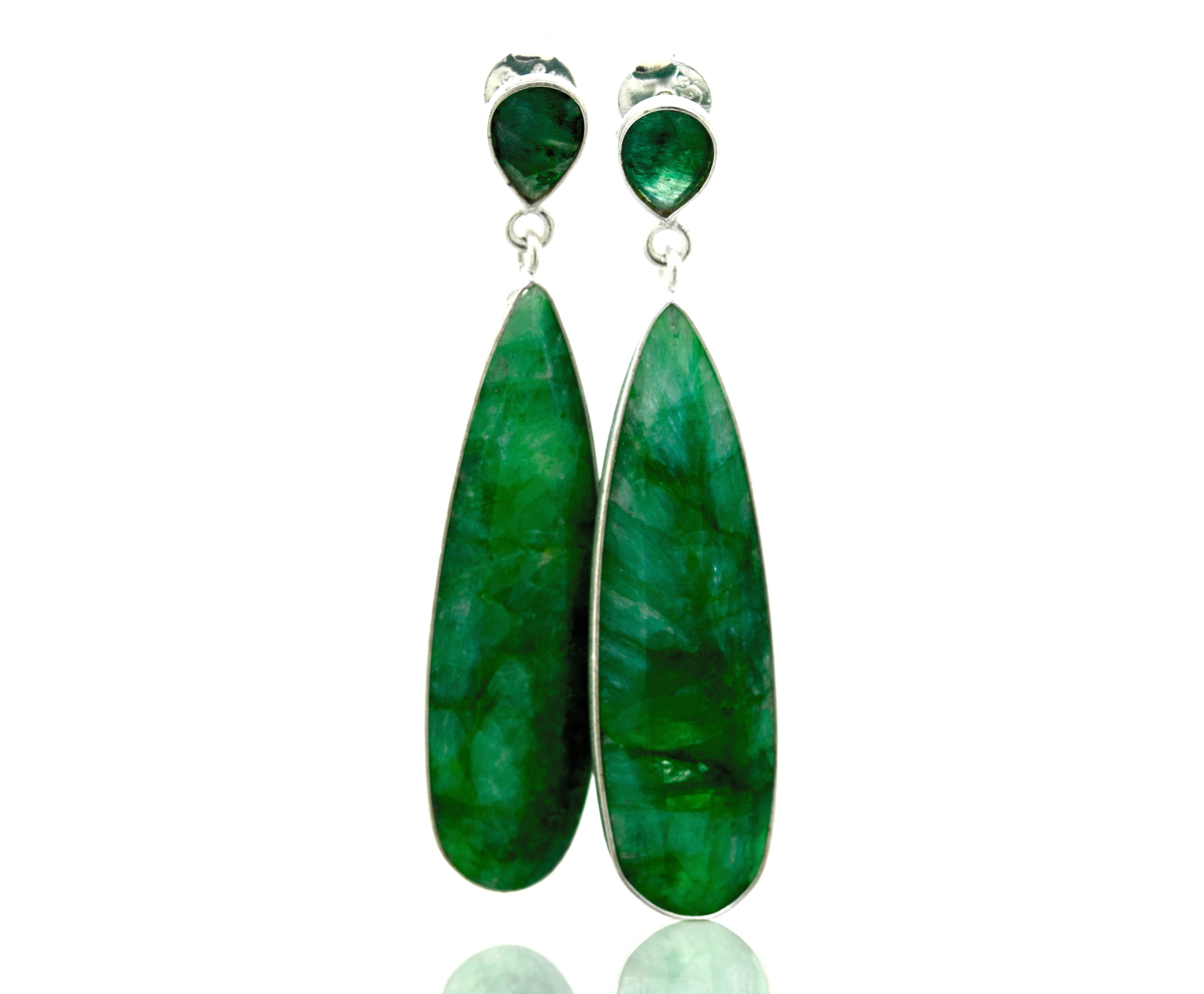 A pair of Vibrant Teardrop Shape Emerald Earrings by Super Silver on a white background. These exquisite earrings are made of .925 Silver and feature stunning emerald accents.