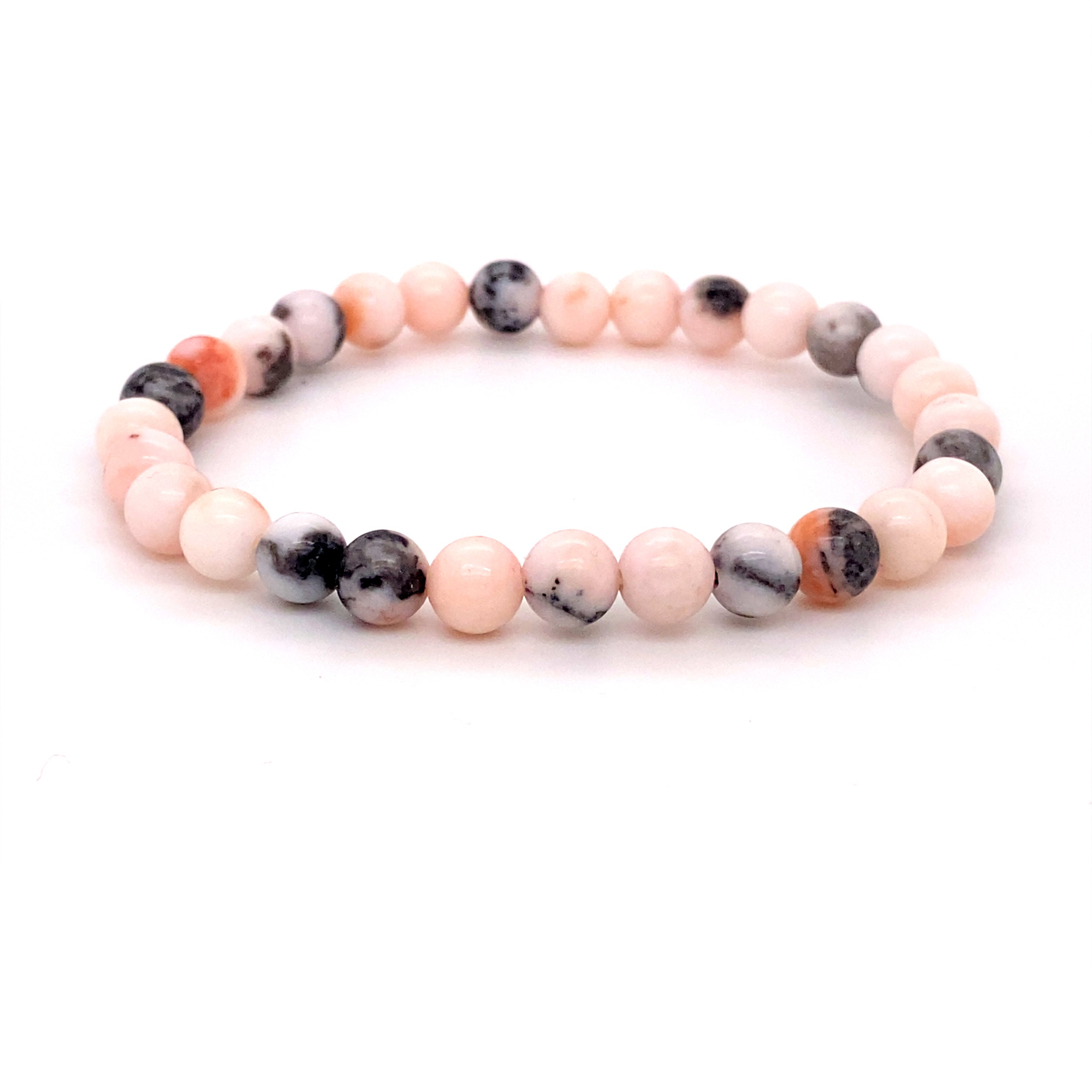 A Super Silver beaded stone bracelet with pink and black marble beads.