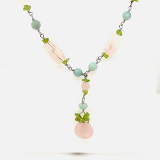 
                  
                    A Super Silver Beaded Multicolor Y-necklace featuring pink and green beaded stones.
                  
                