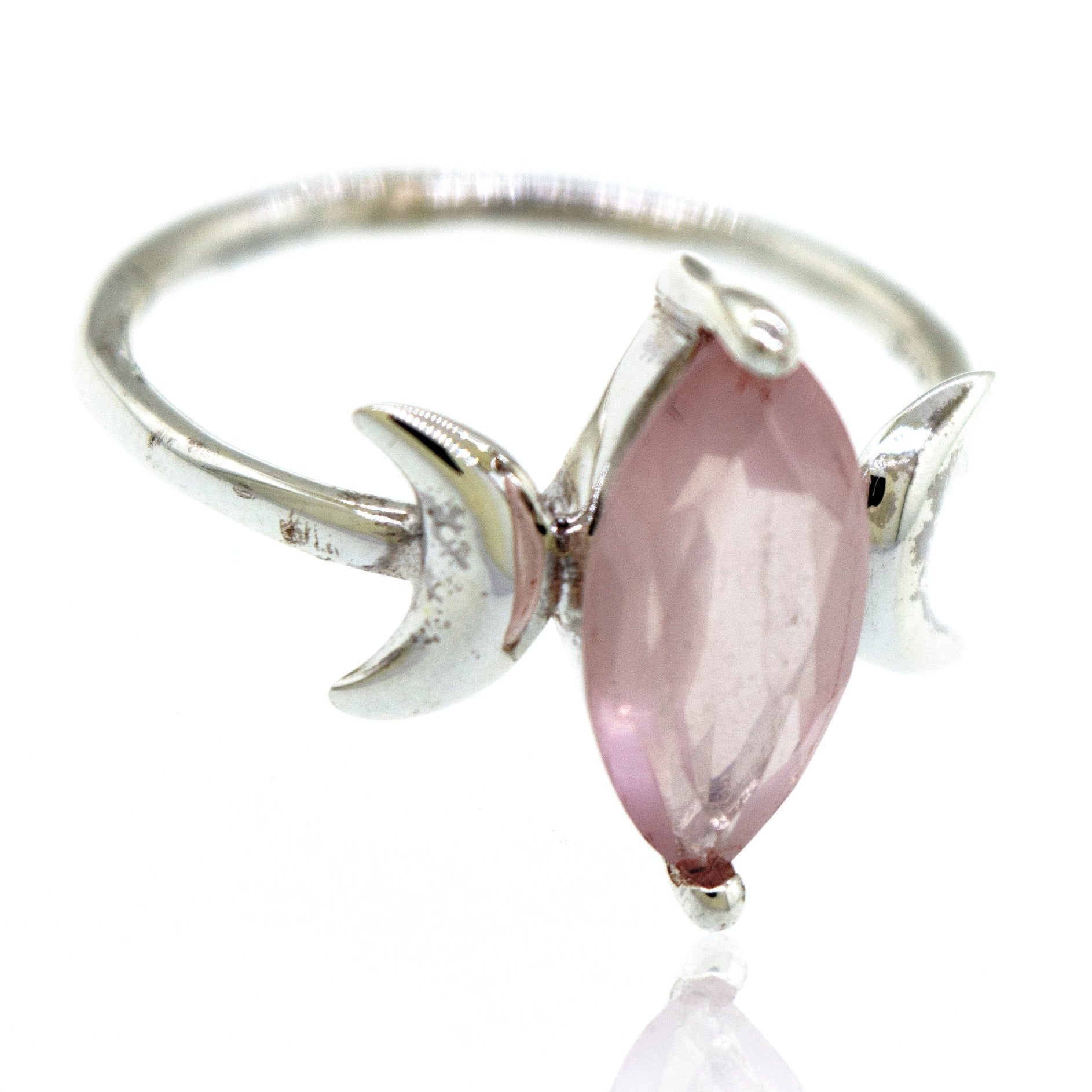 Online Only Exclusive Rose Quartz Crescent Moon Ring featuring a pink marquise-cut rose quartz gemstone held by prongs shaped like shark fins.