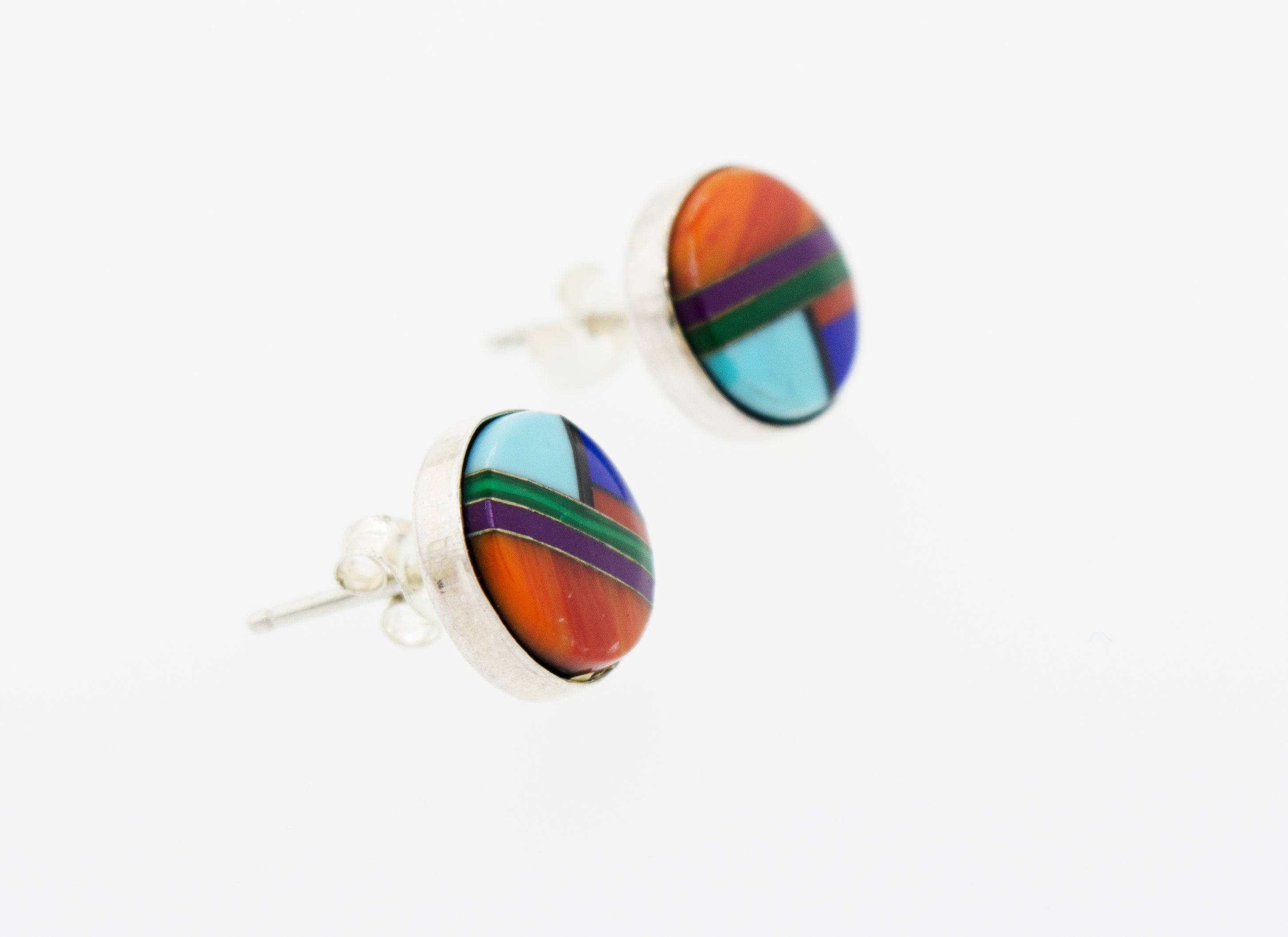 A pair of Super Silver American made, multi-stone round stud earrings in sterling silver on a white surface.