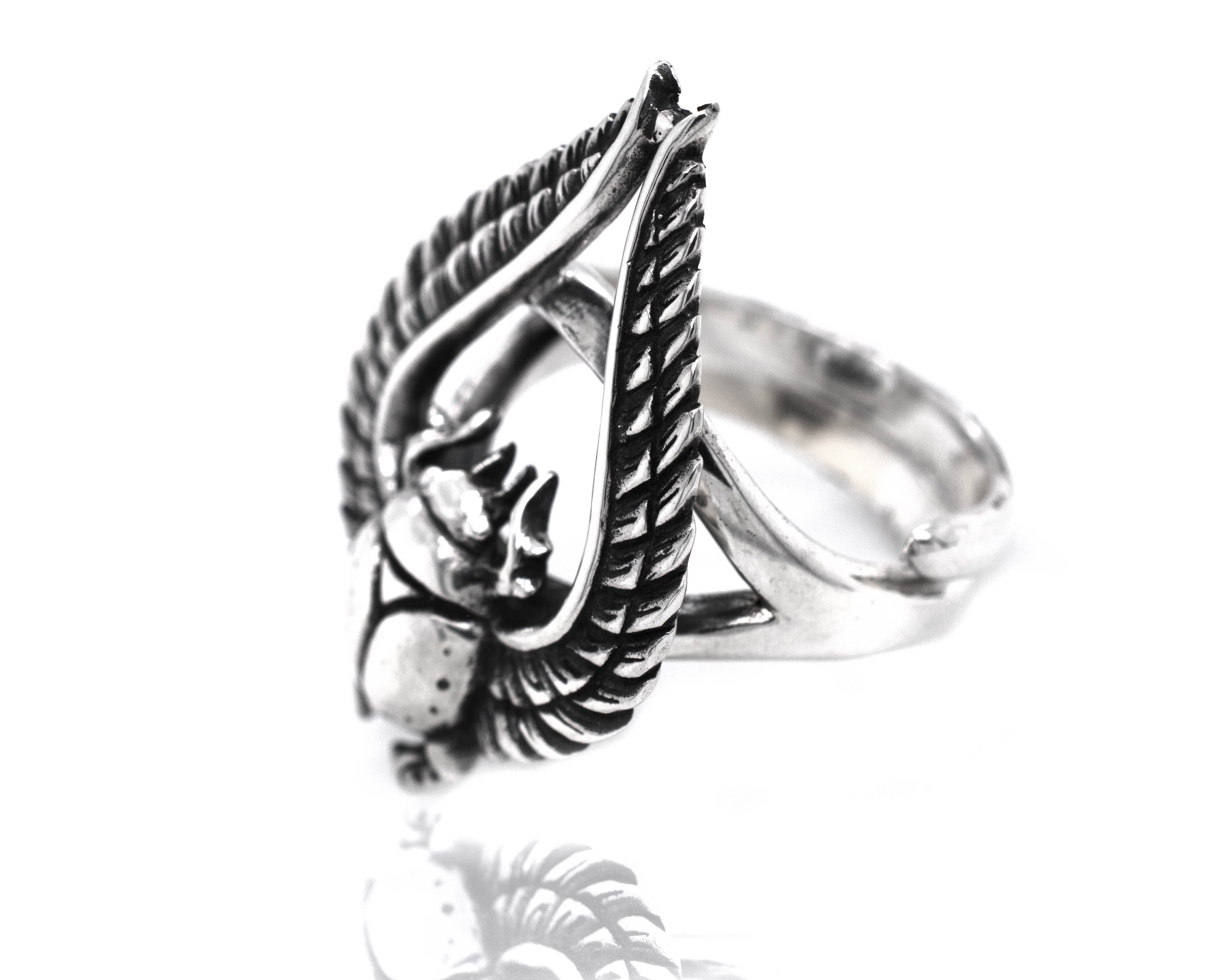 A bold Winged Scarab Ring with an eagle on it.