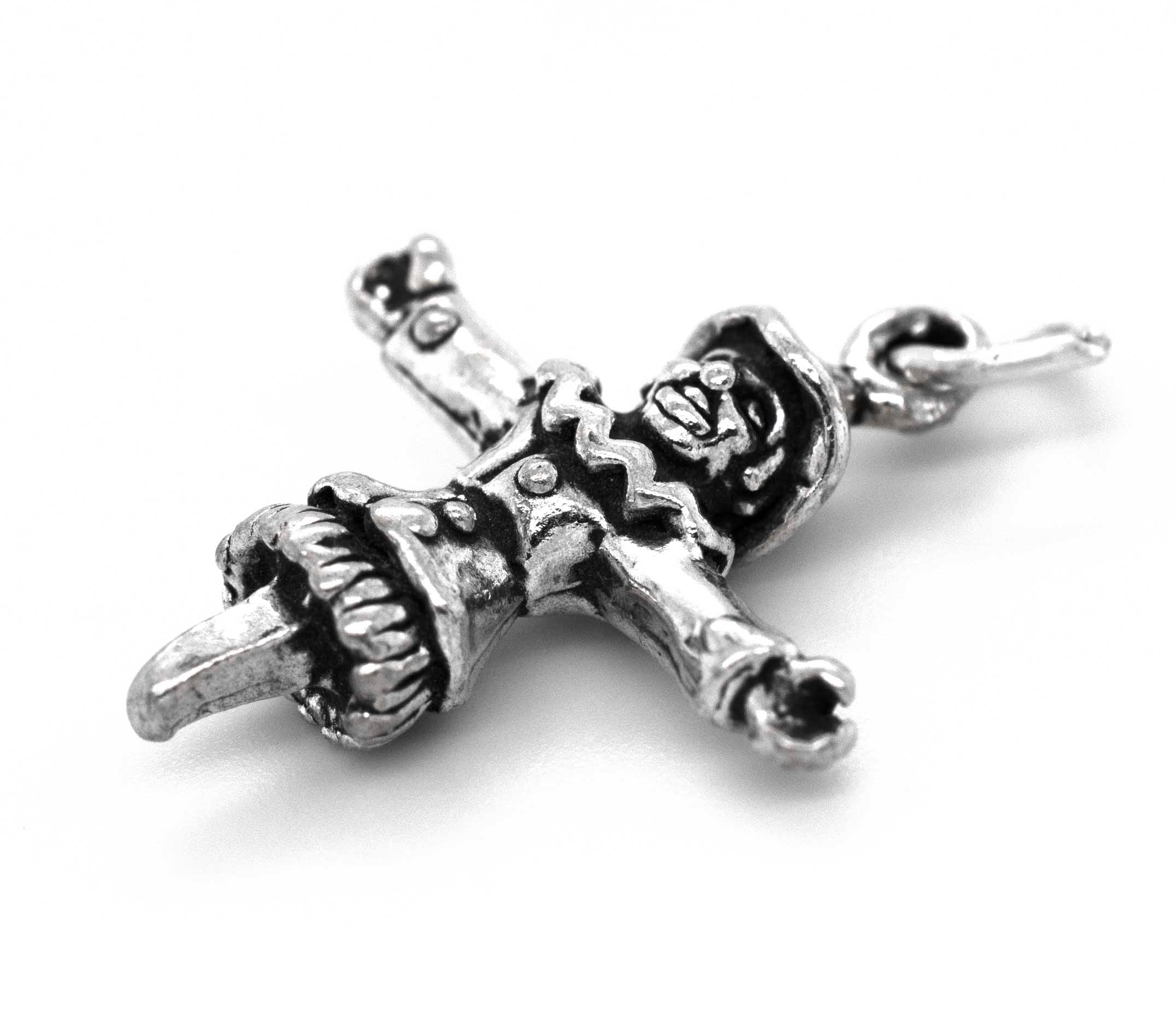 A Super Silver Spooky Scarecrow Charm pendant with a skull and crossbones on it.