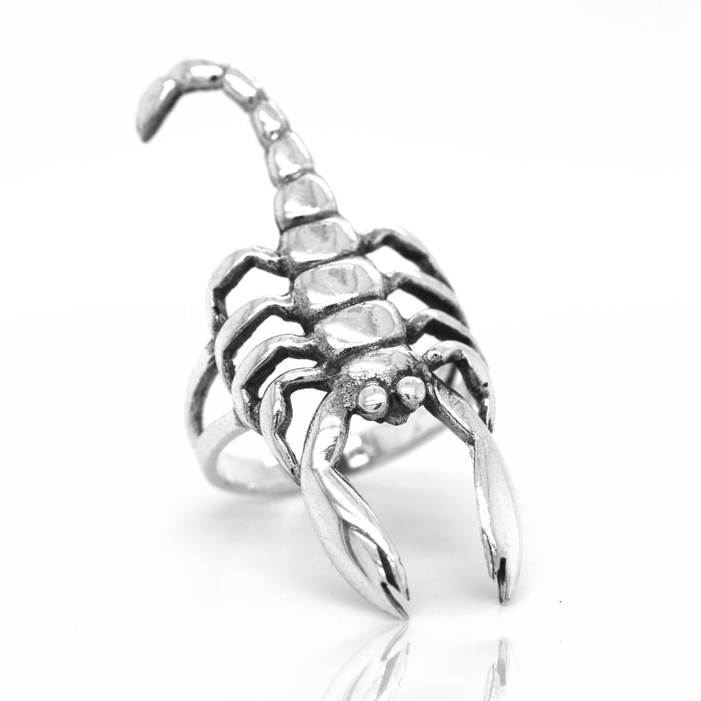 A Striking Scorpion ring by Super Silver on a white background.