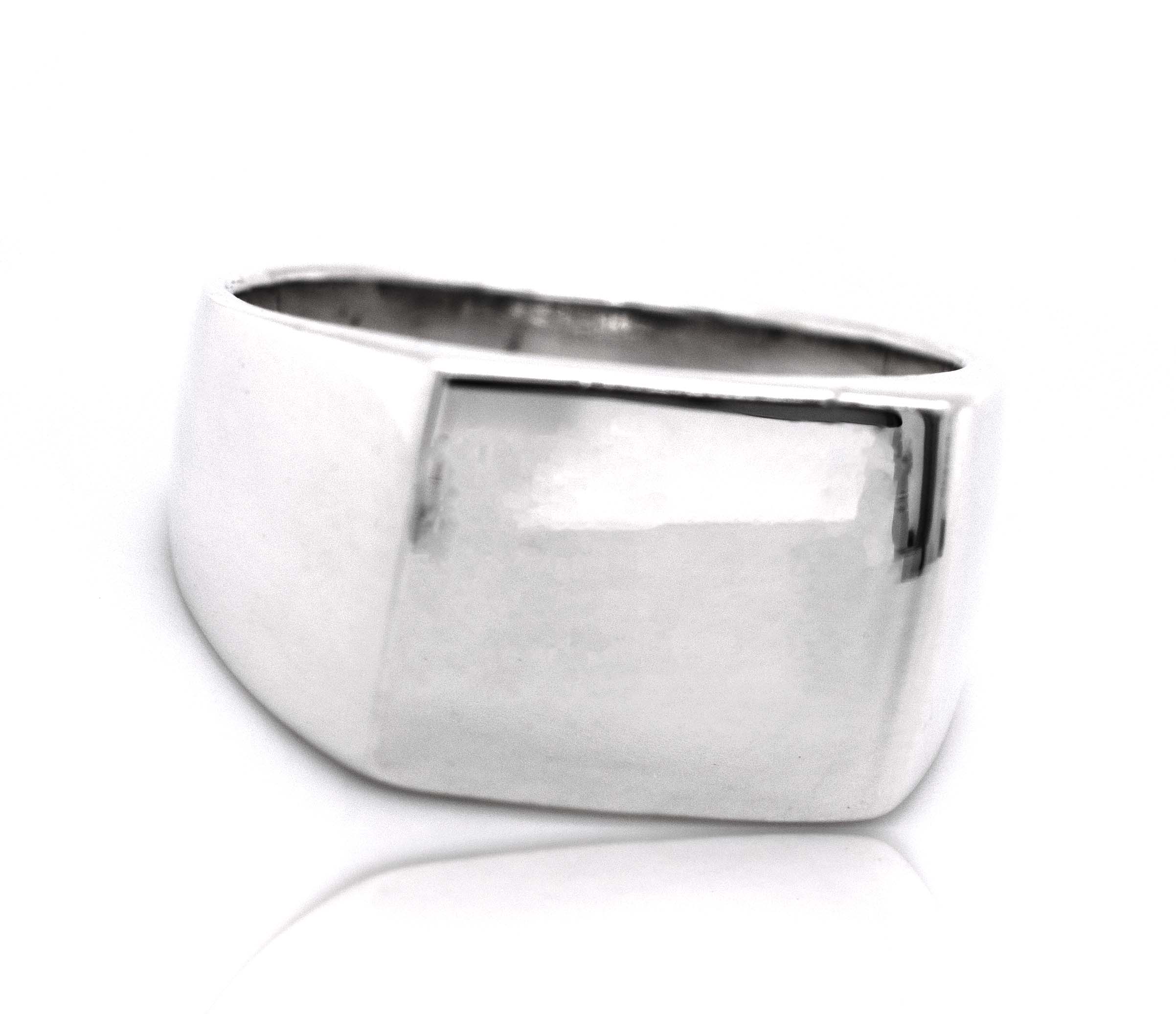 A Signet Ring with a square-shaped band, made of sterling silver.